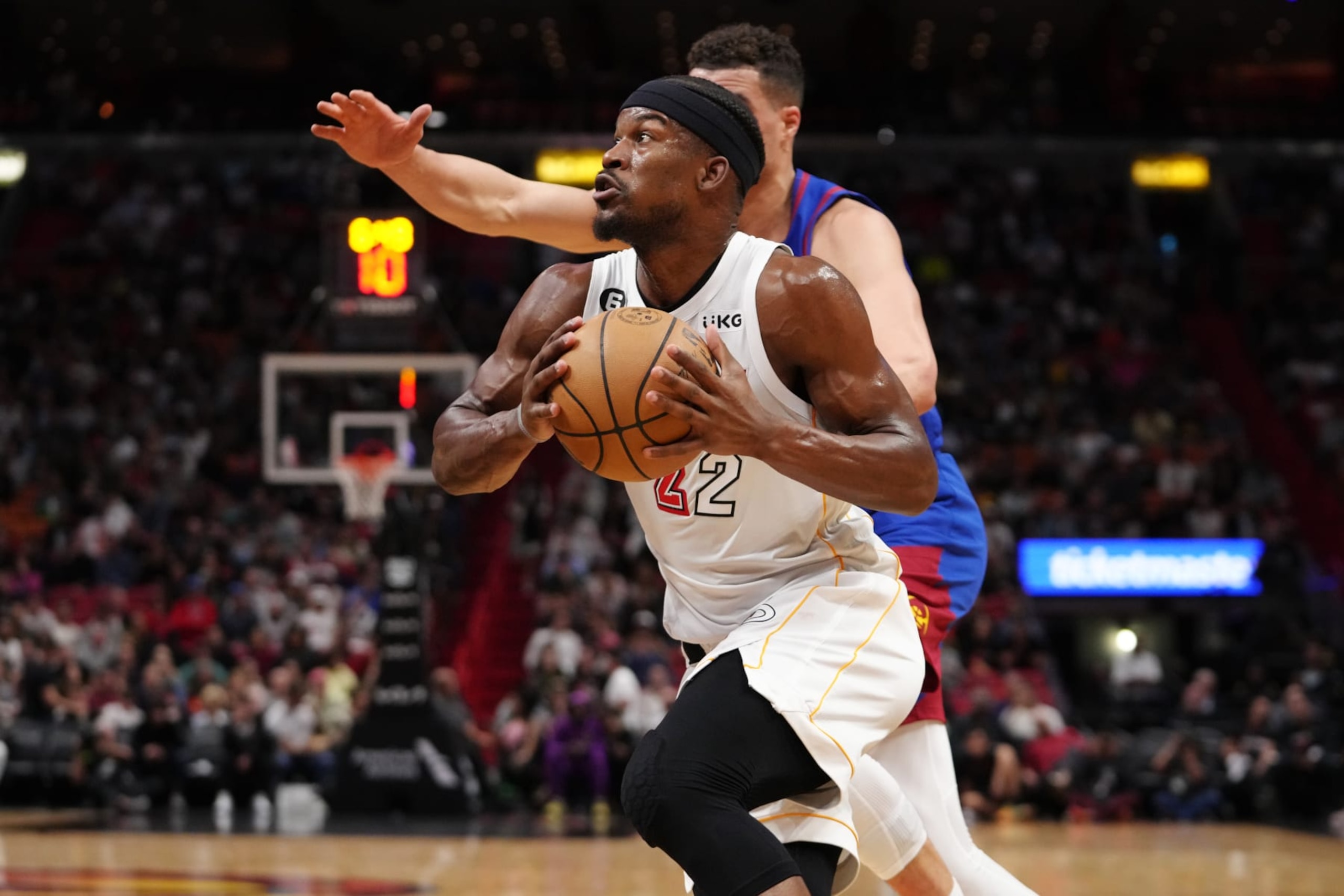 MIAMI, FL - FEBRUARY 13: Jimmy Butler #22 of the Miami Heat drives to the basket during the game against the Denver Nuggets on February 13, 2023 at Miami-Dade Arena in Miami, Florida. NOTE TO USER: User expressly acknowledges and agrees that, by downloading and or using this Photograph, user is consenting to the terms and conditions of the Getty Images License Agreement. Mandatory Copyright Notice: Copyright 2023 NBAE (Photo by Eric Espada/NBAE via Getty Images)