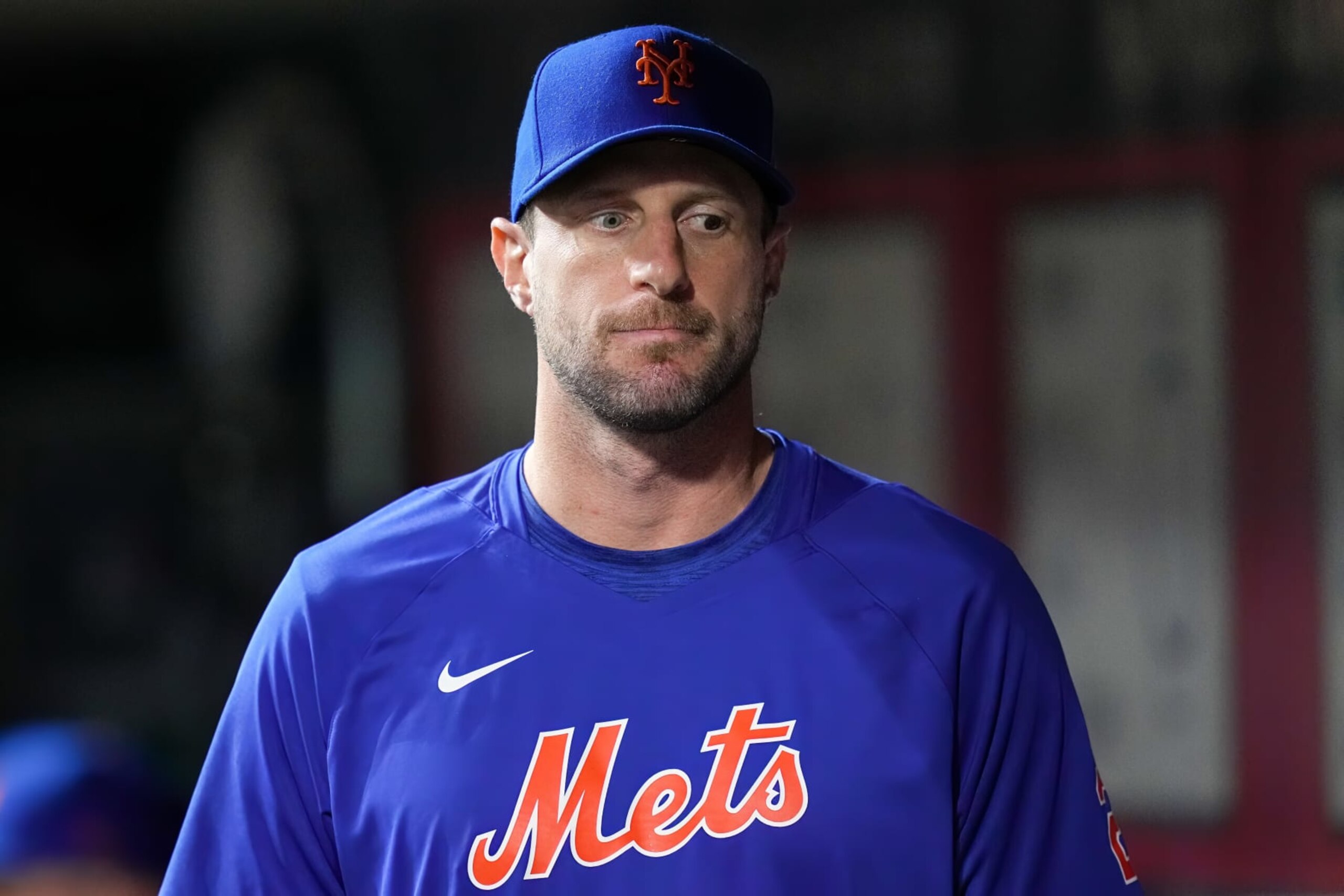 CINCINNATI, OHIO - MAY 10: Max Scherzer #21 of the New York Mets walks through the dugout in the seventh inning against the Cincinnati Reds at Great American Ball Park on May 10, 2023 in Cincinnati, Ohio. (Photo by Dylan Buell/Getty Images)