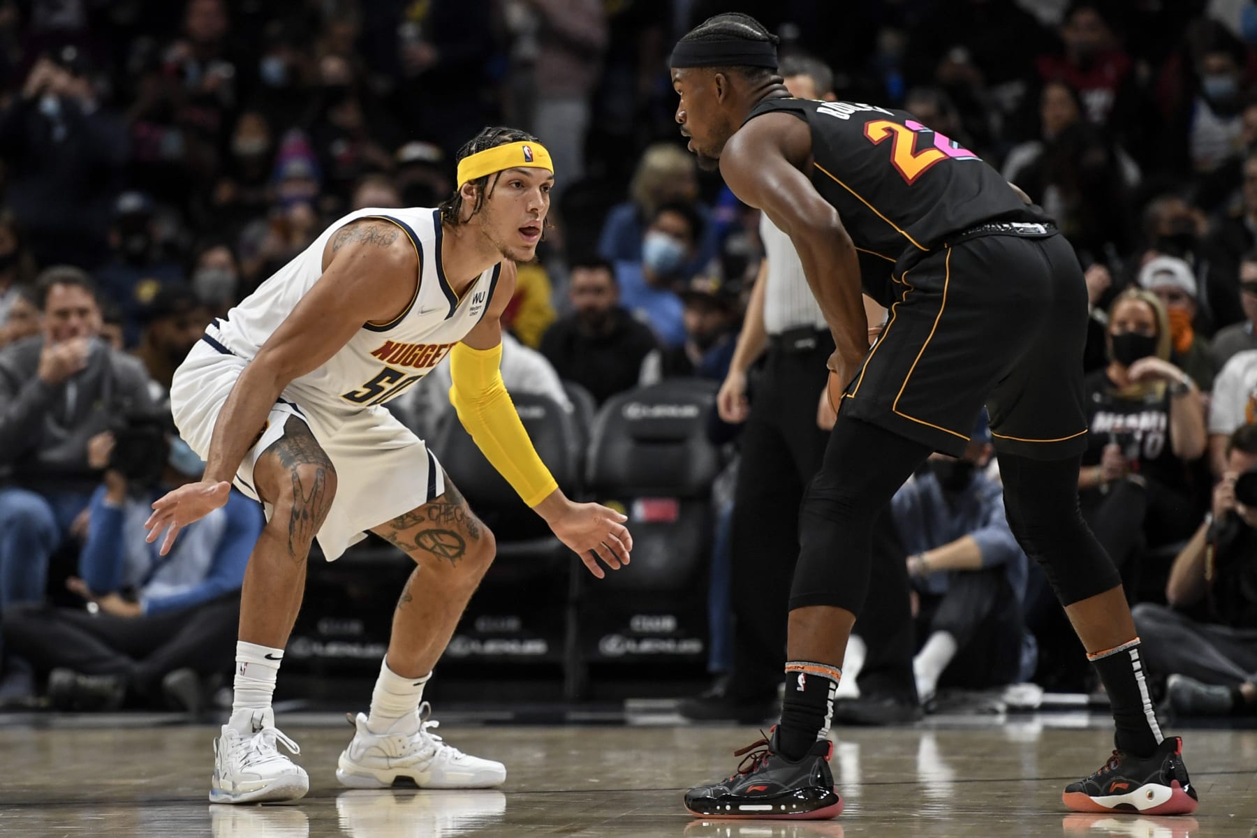 DENVER, CO - NOVEMBER 8: Aaron Gordon (50) of the Denver Nuggets guards Jimmy Butler (22) of the Miami Heat during the first quarter on Monday, November 8, 2021. (Photo by AAron Ontiveroz/MediaNews Group/The Denver Post via Getty Images)