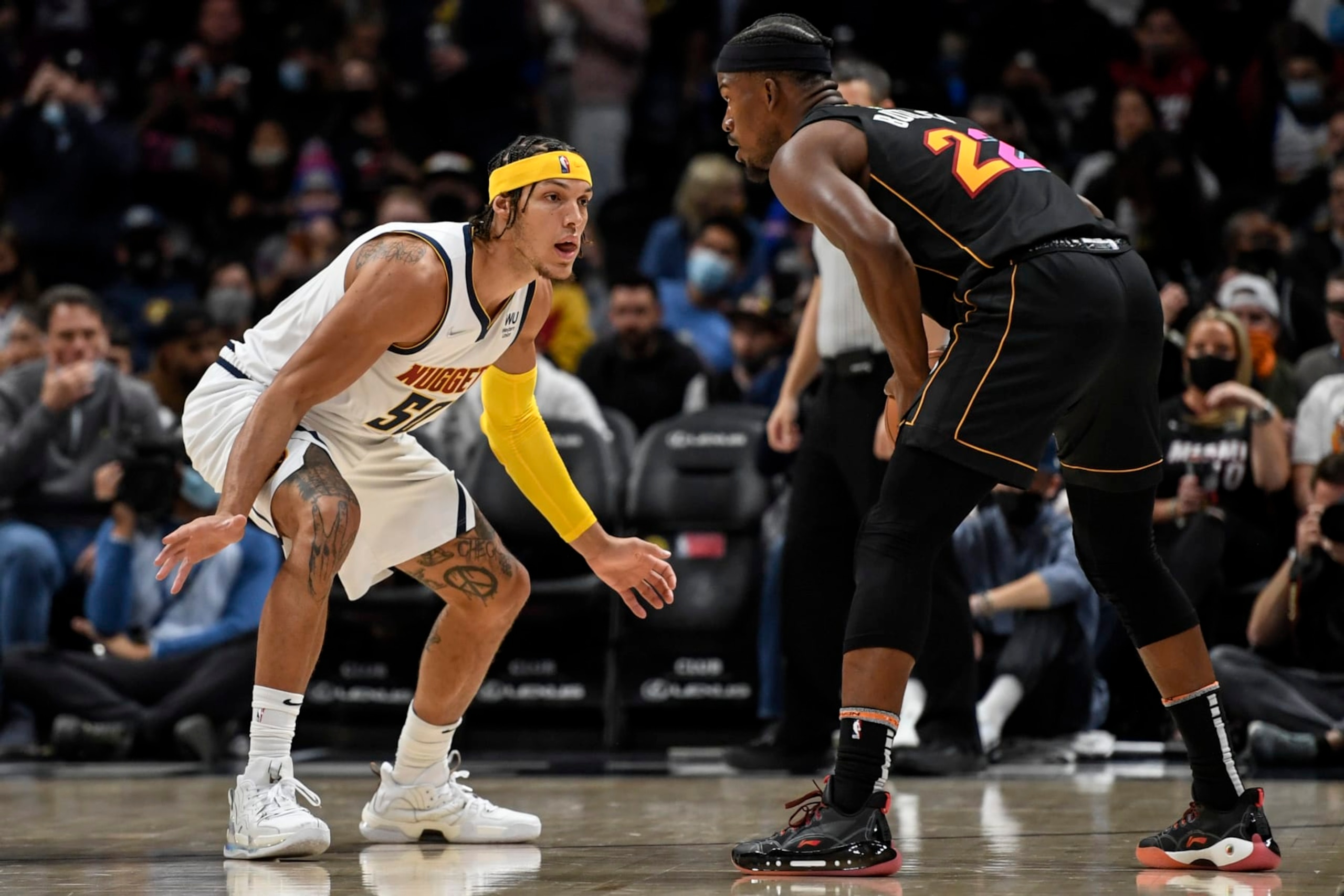 DENVER, CO - NOVEMBER 8: Aaron Gordon (50) of the Denver Nuggets guards Jimmy Butler (22) of the Miami Heat during the first quarter on Monday, November 8, 2021. (Photo by AAron Ontiveroz/MediaNews Group/The Denver Post via Getty Images)