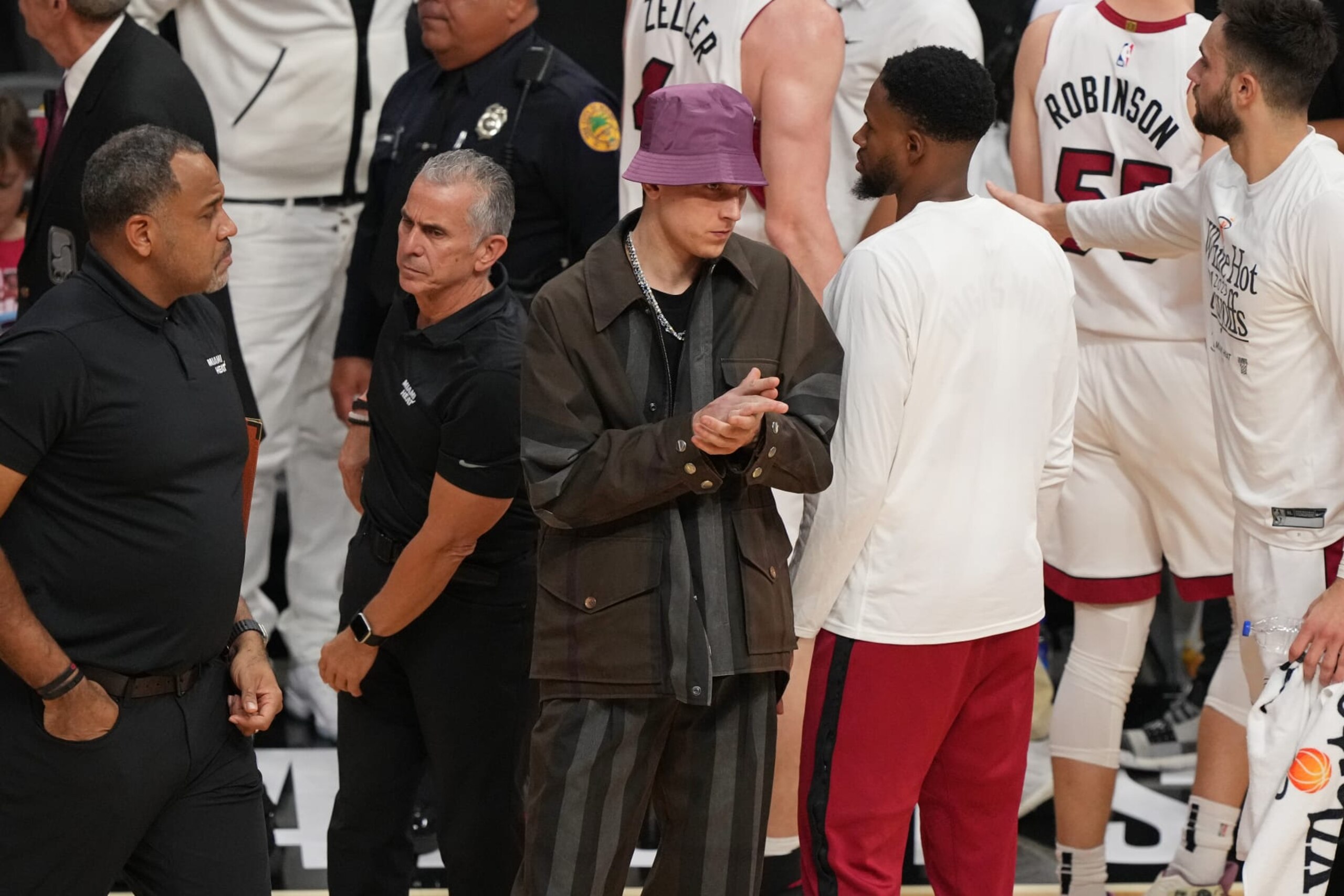 MIAMI, FL - MAY 23: Tyler Herro #14 of the Miami Heat looks on during round 3 game 4 of the Eastern Conference finals 2023 NBA Playoffs against the Boston Celtics on May 23, 2023 at Kaseya Center in Miami, Florida. NOTE TO USER: User expressly acknowledges and agrees that, by downloading and or using this Photograph, user is consenting to the terms and conditions of the Getty Images License Agreement. Mandatory Copyright Notice: Copyright 2023 NBAE (Photo by Eric Espada/NBAE via Getty Images)