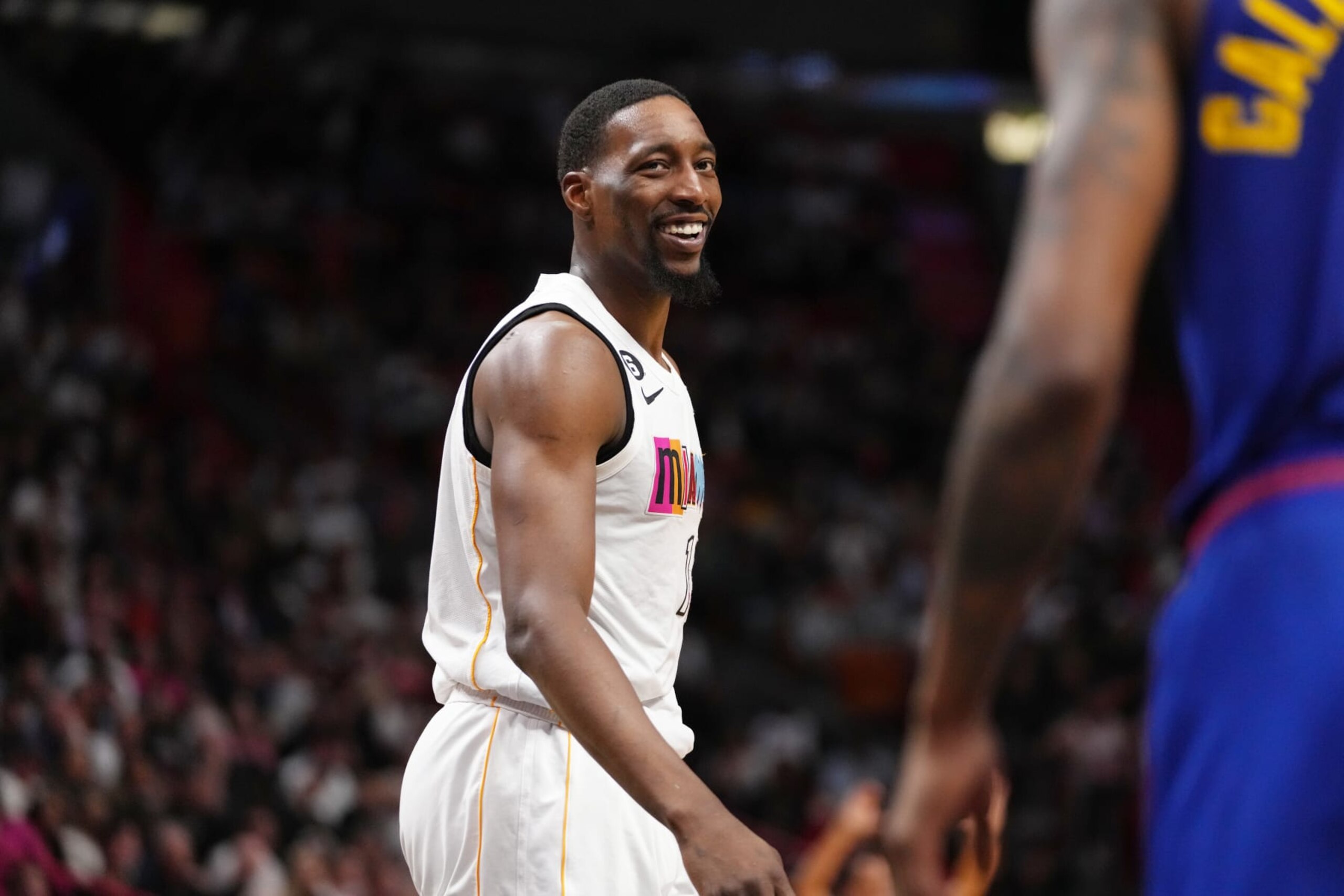 MIAMI, FL - FEBRUARY 13: Bam Adebayo #13 of the Miami Heat smiles during the game against the Denver Nuggets on February 13, 2023 at Miami-Dade Arena in Miami, Florida. NOTE TO USER: User expressly acknowledges and agrees that, by downloading and or using this Photograph, user is consenting to the terms and conditions of the Getty Images License Agreement. Mandatory Copyright Notice: Copyright 2023 NBAE (Photo by Eric Espada/NBAE via Getty Images)