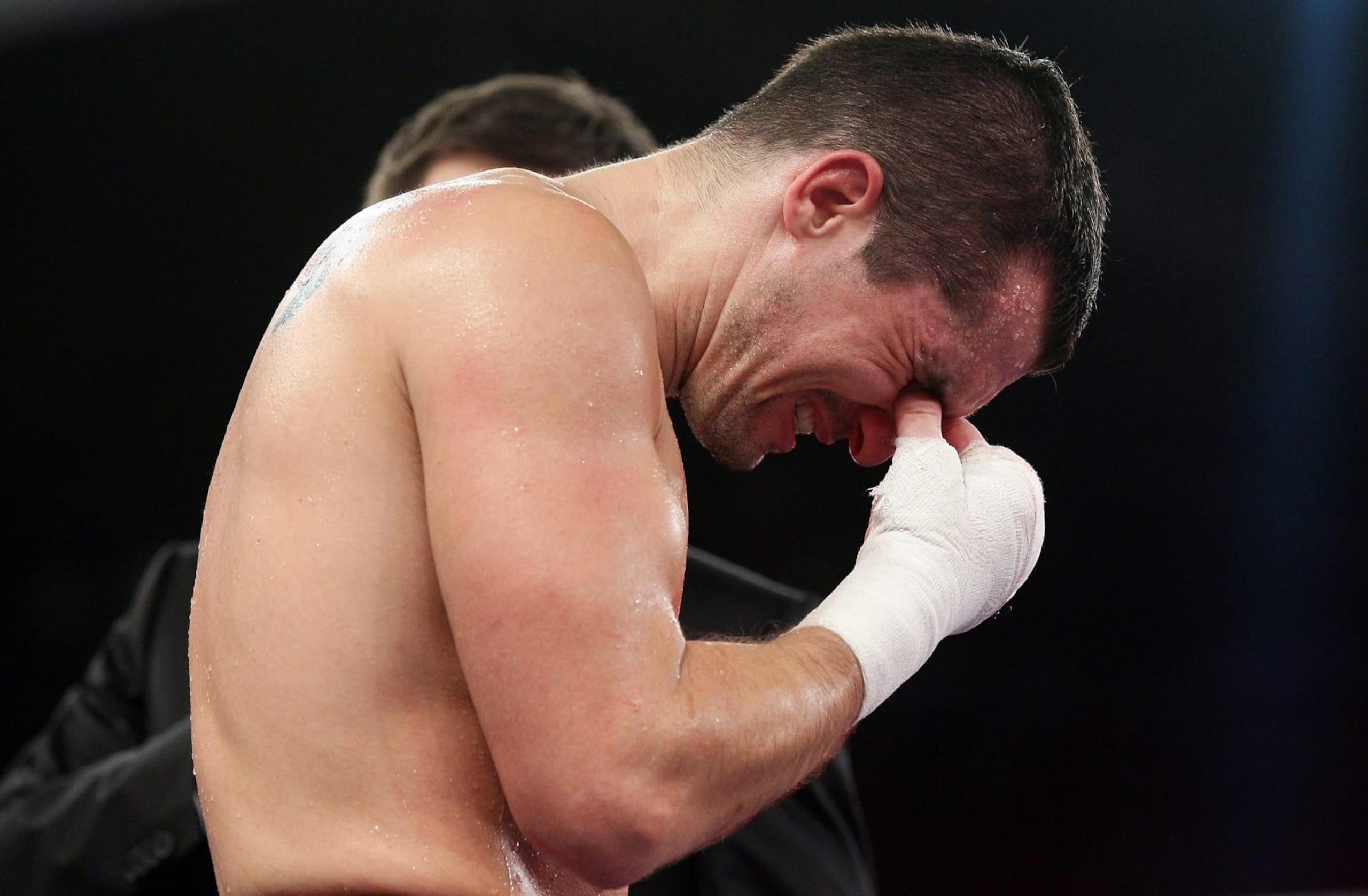 MUELHEIM, GERMANY - FEBRUARY 12: Stjepan Bozic of Croatia cries after losing after a technical knock-out and a broken wrist the super middleweight fight between Arthur Abraham of Germany and Stjepan Bozic of Croatia at the RWE Sporthhall on February 12, 2011 in Muelheim, Germany. (Photo by Christof Koepsel/Bongarts/Getty Images)