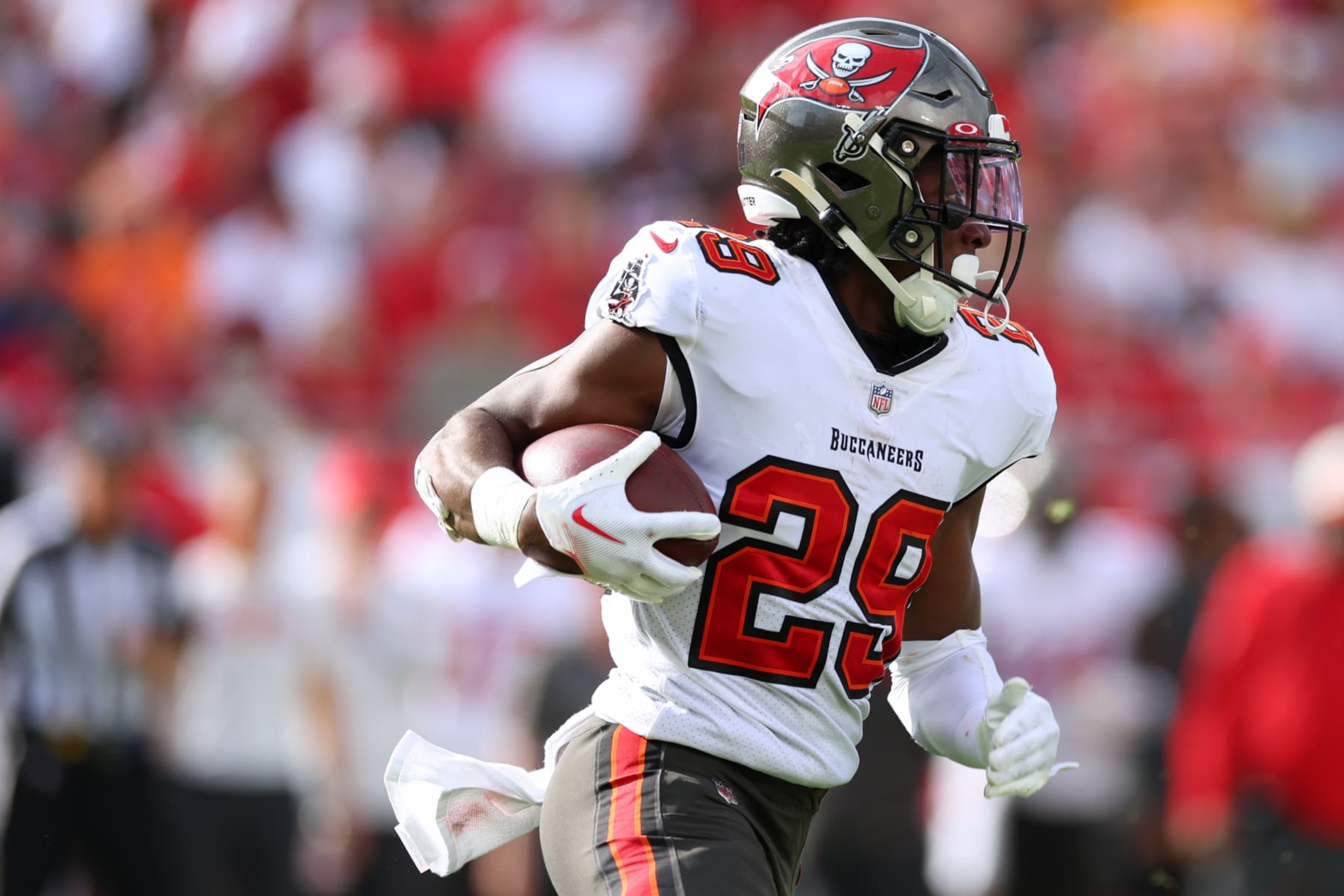 TAMPA, FLORIDA - JANUARY 01: Rachaad White #29 of the Tampa Bay Buccaneers runs the ball during the third quarter against the Carolina Panthers at Raymond James Stadium on January 01, 2023 in Tampa, Florida. (Photo by Mike Ehrmann/Getty Images)