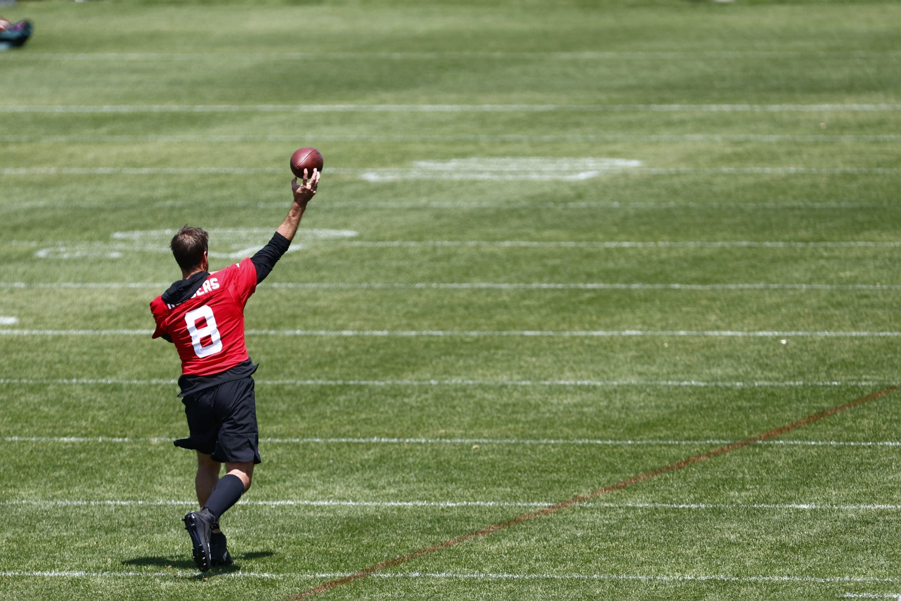 FLORHAM PARK, NEW JERSEY - MAY 31: Quarterback Aaron Rodgers #8 of the New York Jets throws on a side field during the team's OTA's at Atlantic Health Jets Training Center on May 31, 2023 in Florham Park, New Jersey. (Photo by Rich Schultz/Getty Images)