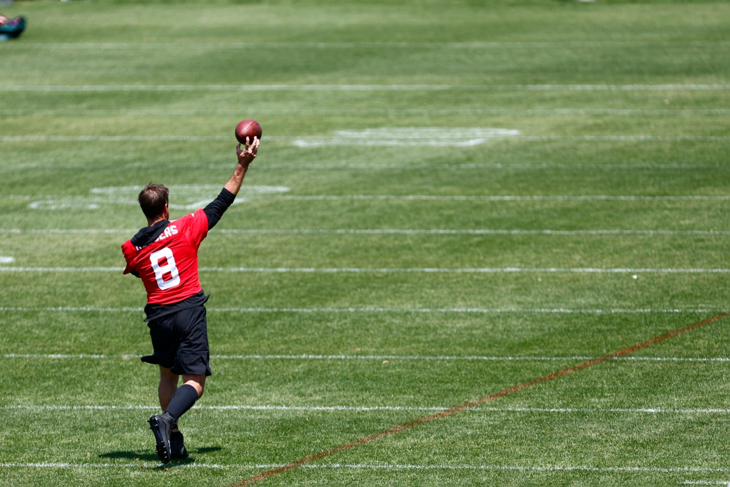 FLORHAM PARK, NEW JERSEY - MAY 31: Quarterback Aaron Rodgers #8 of the New York Jets throws on a side field during the team's OTA's at Atlantic Health Jets Training Center on May 31, 2023 in Florham Park, New Jersey. (Photo by Rich Schultz/Getty Images)