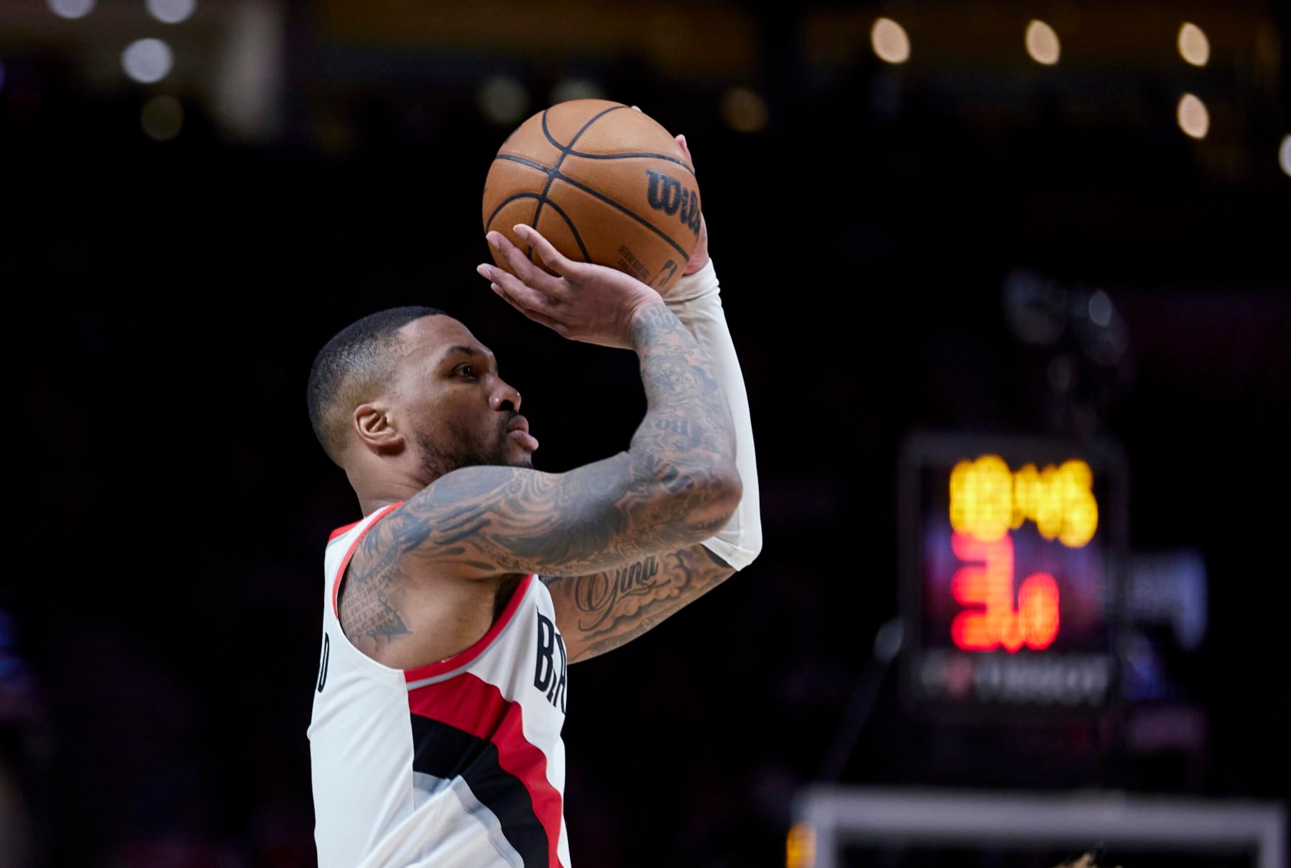 Portland Trail Blazers guard Damian Lillard shoots a 3-point basket against the New York Knicks during the second half of an NBA basketball game in Portland, Ore., Tuesday, March 14, 2023. (AP Photo/Craig Mitchelldyer) Portland Trail Blazers guard Damian Lillard shoots a 3-point basket against the New York Knicks during the second half of an NBA basketball game in Portland, Ore., Tuesday, March 14, 2023. (AP Photo/Craig Mitchelldyer)