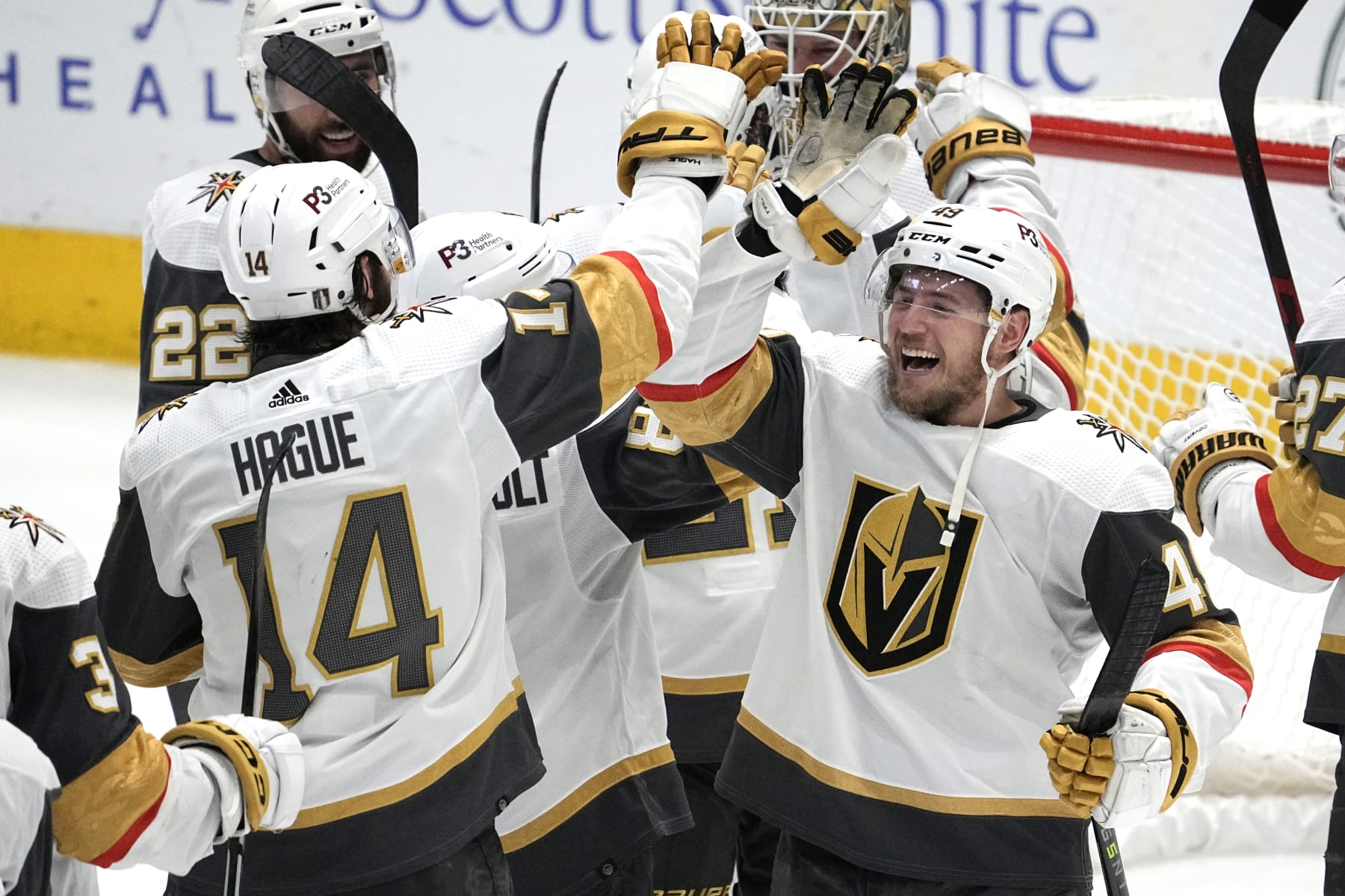 DALLAS, TEXAS - MAY 29: Nicolas Hague #14 of the Vegas Golden Knights and Ivan Barbashev #49 celebrate after Game Six of the Western Conference Final against the Dallas Stars of the 2023 Stanley Cup Playoffs at American Airlines Center on May 29, 2023 in Dallas, Texas. (Photo by Sam Hodde/NHLI via Getty Images)