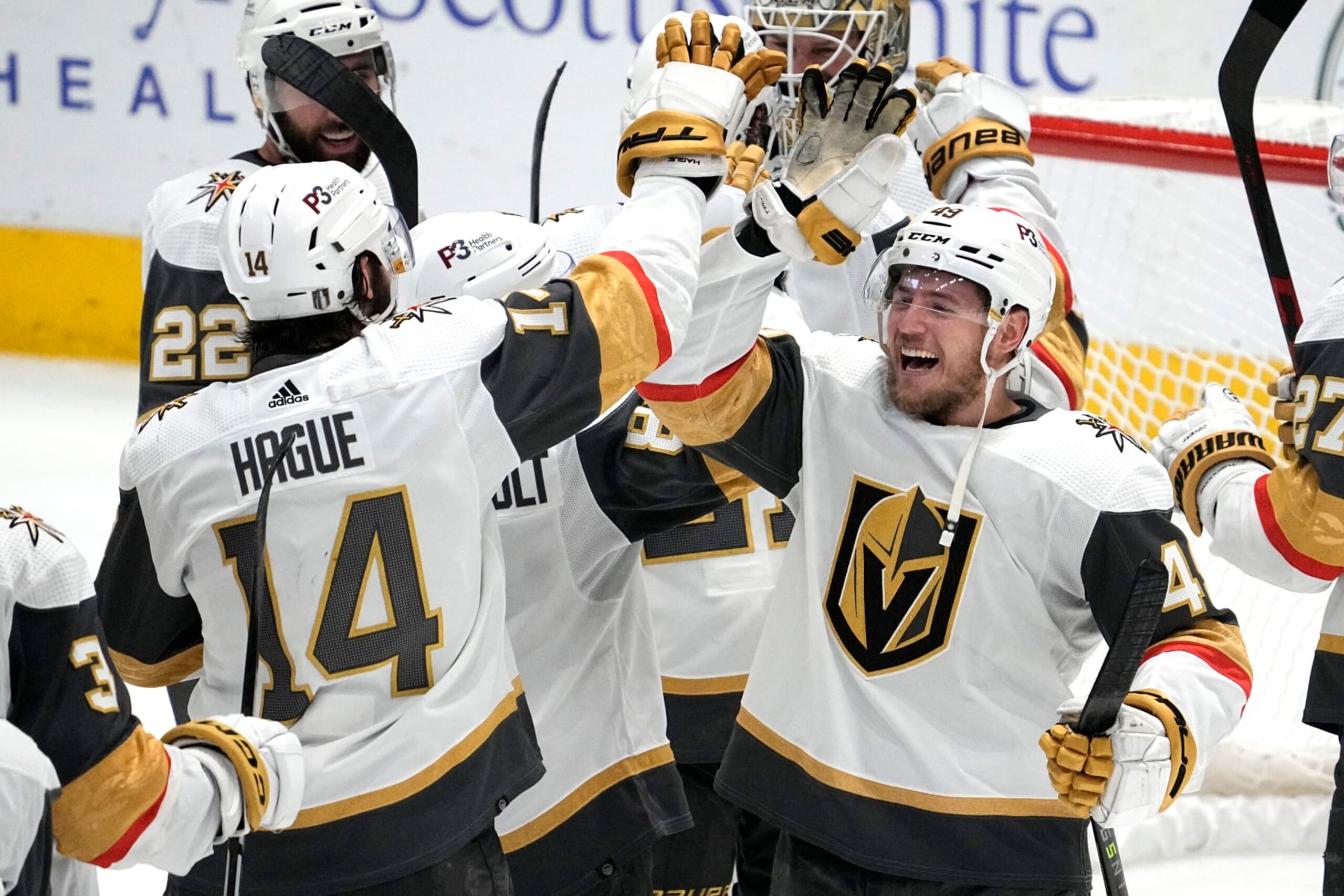 DALLAS, TEXAS - MAY 29: Nicolas Hague #14 of the Vegas Golden Knights and Ivan Barbashev #49 celebrate after Game Six of the Western Conference Final against the Dallas Stars of the 2023 Stanley Cup Playoffs at American Airlines Center on May 29, 2023 in Dallas, Texas. (Photo by Sam Hodde/NHLI via Getty Images)