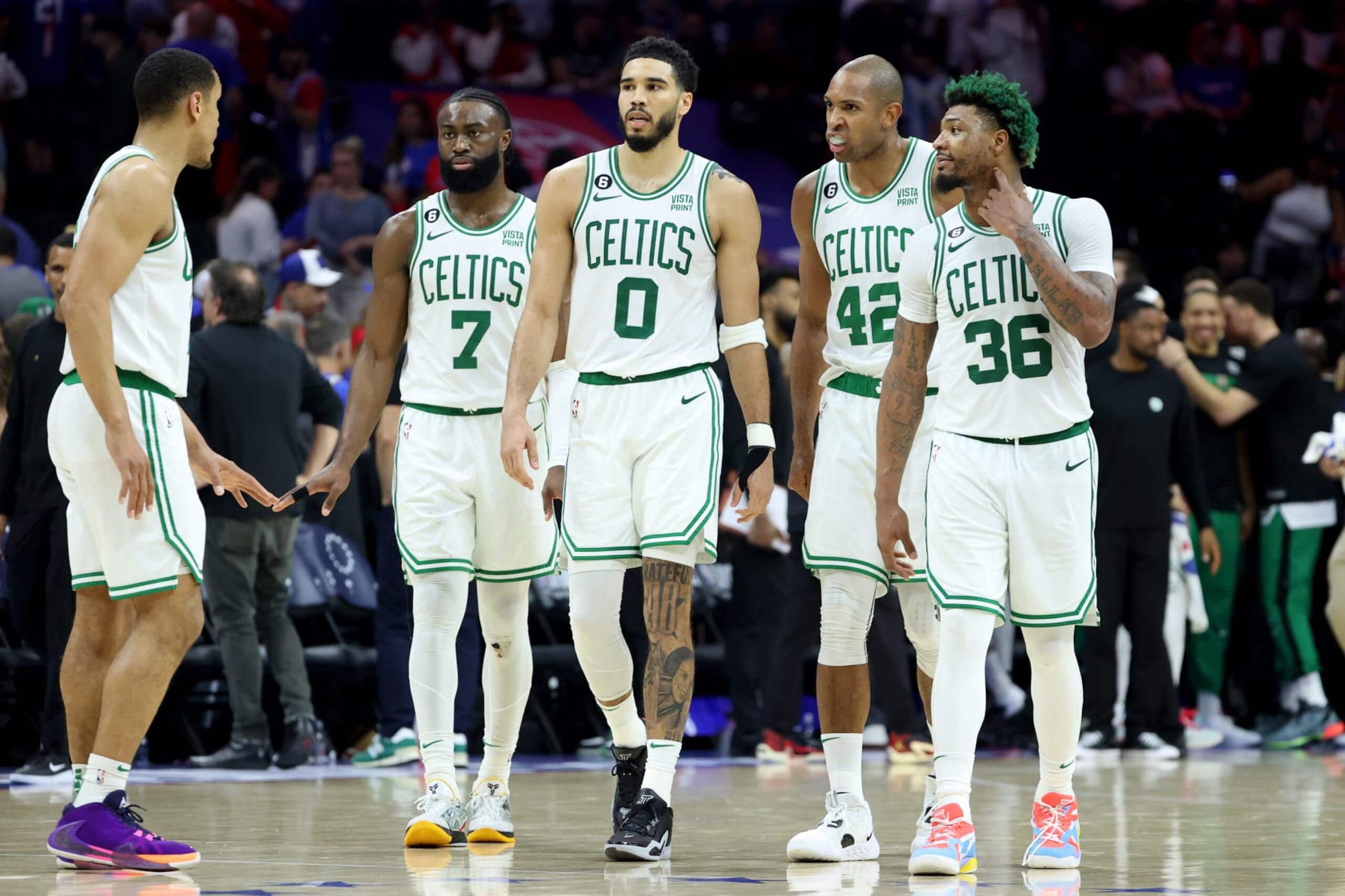 PHILADELPHIA, PENNSYLVANIA - MAY 11: Malcolm Brogdon #13, Jaylen Brown #7, Jayson Tatum #0, Al Horford #42 and Marcus Smart #36 of the Boston Celtics talk against the Philadelphia 76ers during the fourth quarter in game six of the Eastern Conference Semifinals in the 2023 NBA Playoffs at Wells Fargo Center on May 11, 2023 in Philadelphia, Pennsylvania. NOTE TO USER: User expressly acknowledges and agrees that, by downloading and or using this photograph, User is consenting to the terms and conditions of the Getty Images License Agreement. (Photo by Tim Nwachukwu/Getty Images)