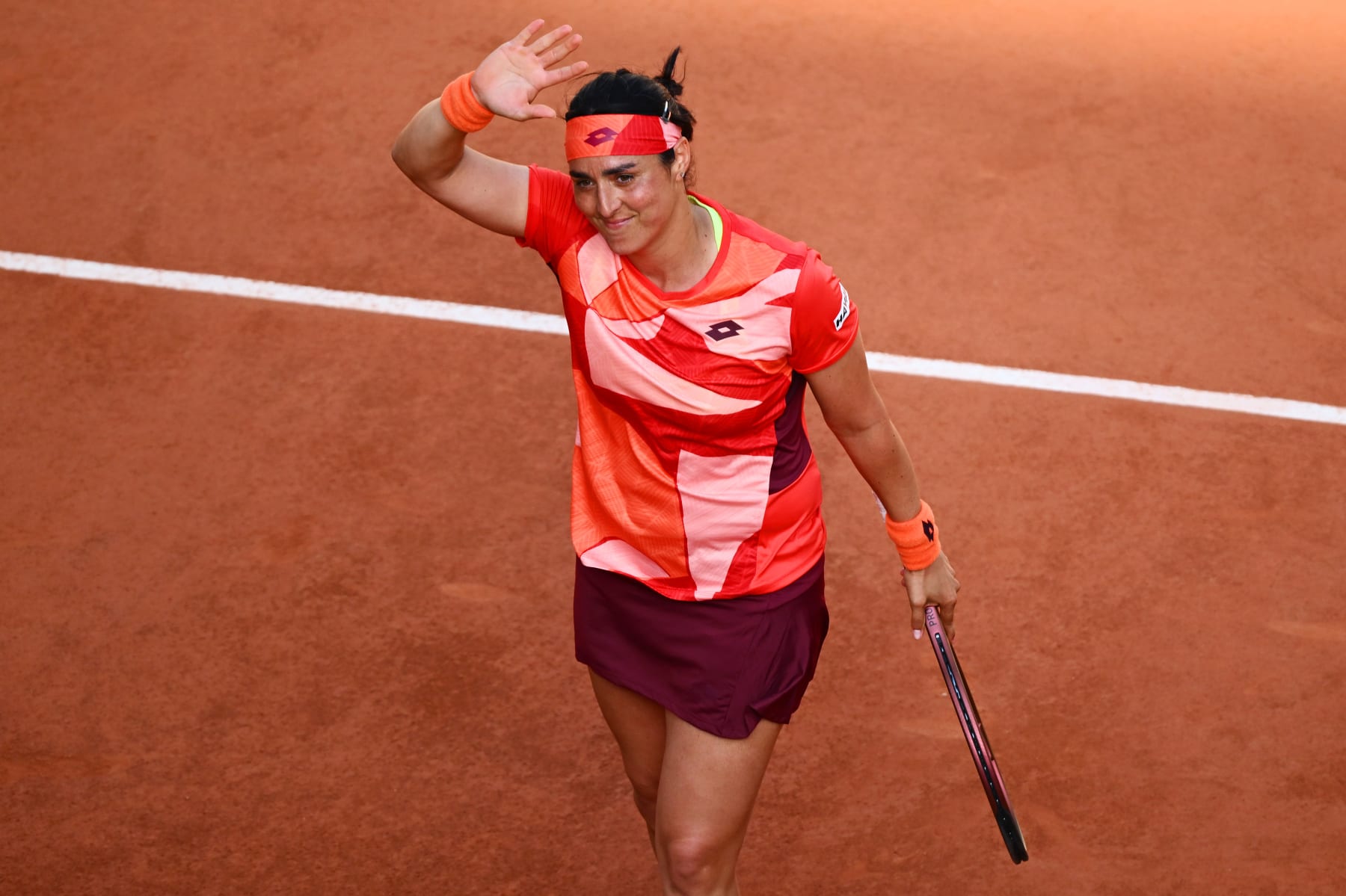 PARIS, FRANCE - JUNE 01: Ons Jabeur of Tunisia celebrates winning match point against Oceane Dodin of France during the Women's Singles Second Round match on Day Five of the 2023 French Open at Roland Garros on June 01, 2023 in Paris, France. (Photo by Clive Mason/Getty Images)