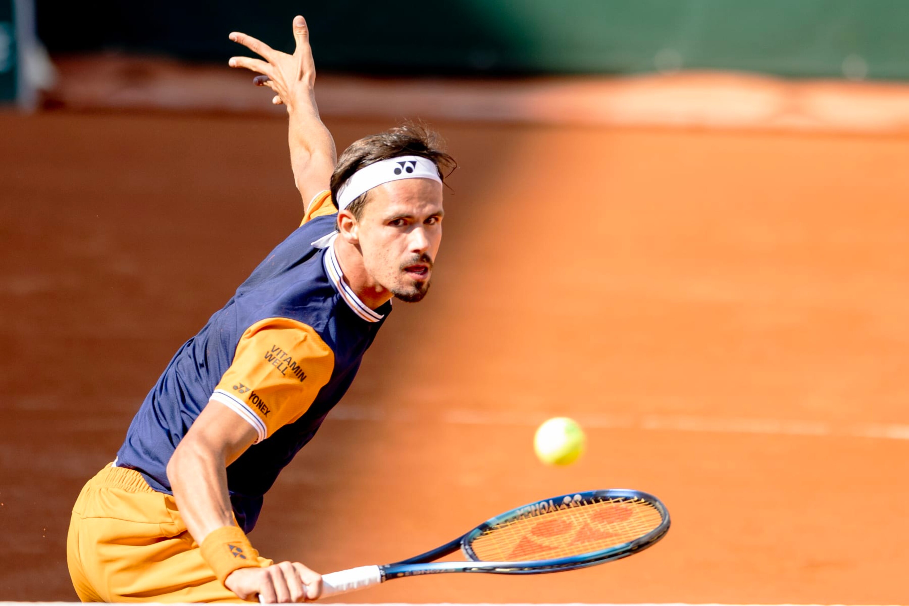 PARIS, FRANCE - JUNE 1.  Daniel Altmaier of Germany in action against Jannik Sinner of Italy in the second round of the singles competition on Court Suzanne Lenglen during the 2023 French Open Tennis Tournament at Roland Garros on June 1st, 2023, in Paris, France. (Photo by Tim Clayton/Corbis via Getty Images)