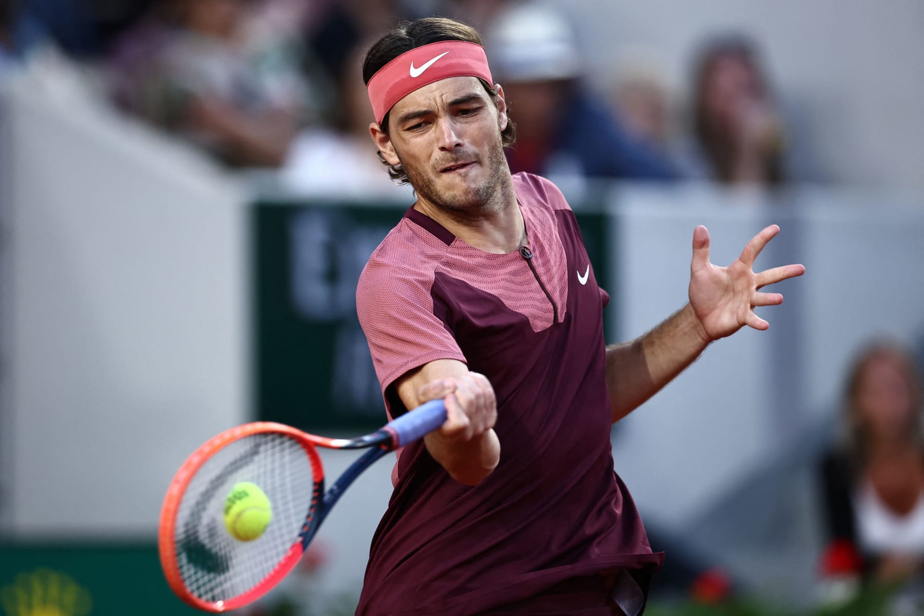 US Taylor Fritz plays a forehand return to France's Arthur Rinderknech during their men's singles match on day five of the Roland-Garros Open tennis tournament at the Court Suzanne-Lenglen in Paris on June 1, 2023. (Photo by Anne-Christine POUJOULAT / AFP) (Photo by ANNE-CHRISTINE POUJOULAT/AFP via Getty Images)