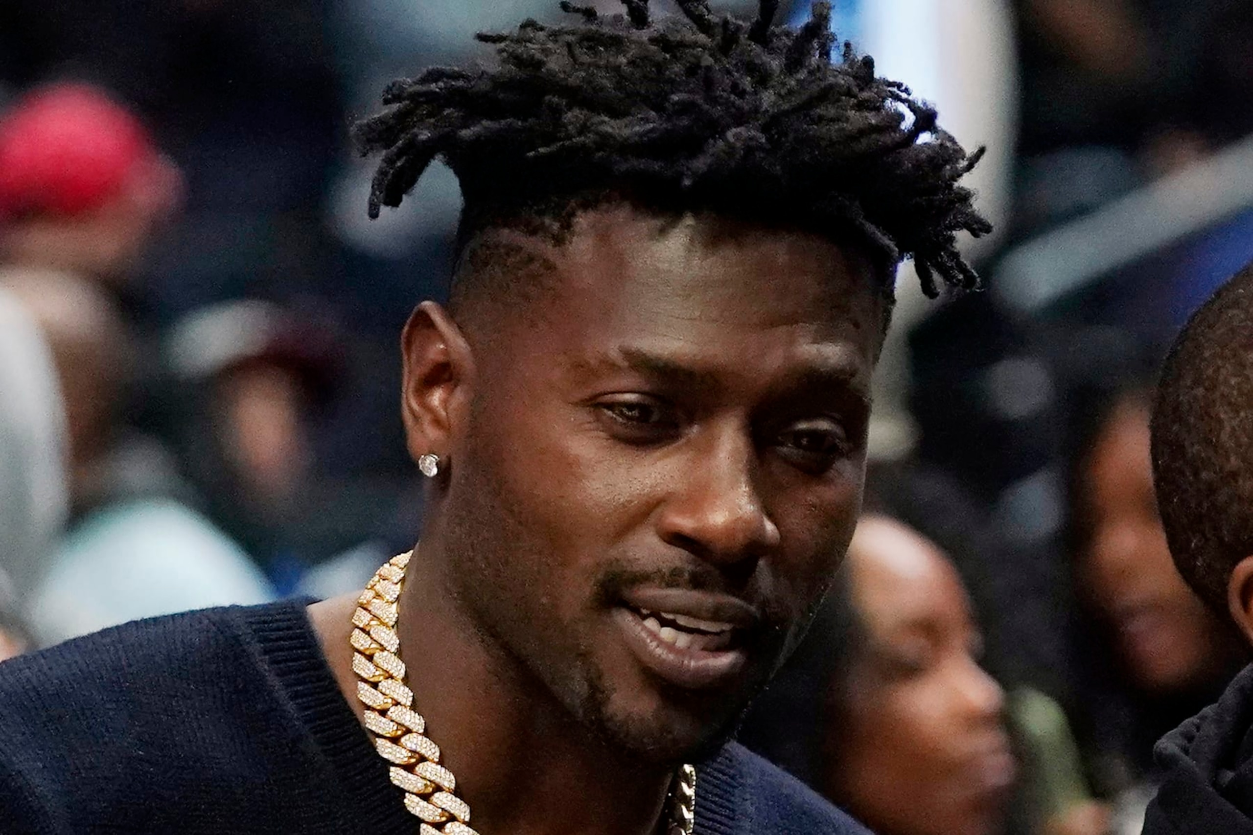 FILE - Former NFL player Antonio Brown watches an NBA basketball game between the Los Angeles Clippers and the Golden State Warriors, Monday, Feb. 14, 2022, in Los Angeles. No charges will be filed against Antonio Brown following an apparent domestic incident at a Tampa, Florida, home in late November, prosecutors said Wednesday, Dec. 21, 2022. (AP Photo/Mark J. Terrill, File)