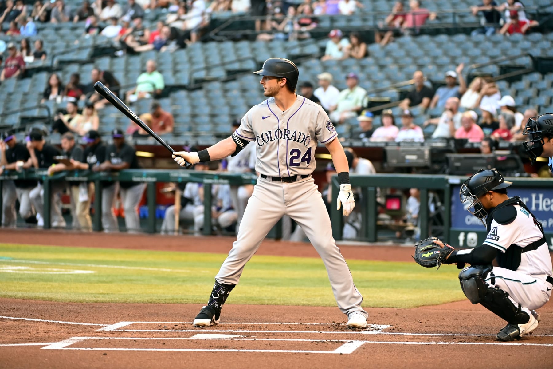 PHOENIX, ARIZONA - MAY 30: Ryan McMahon #24 of the Colorado Rockies gets ready in the batters box against the Arizona Diamondbacks at Chase Field on May 30, 2023 in Phoenix, Arizona. (Photo by Norm Hall/Getty Images)
