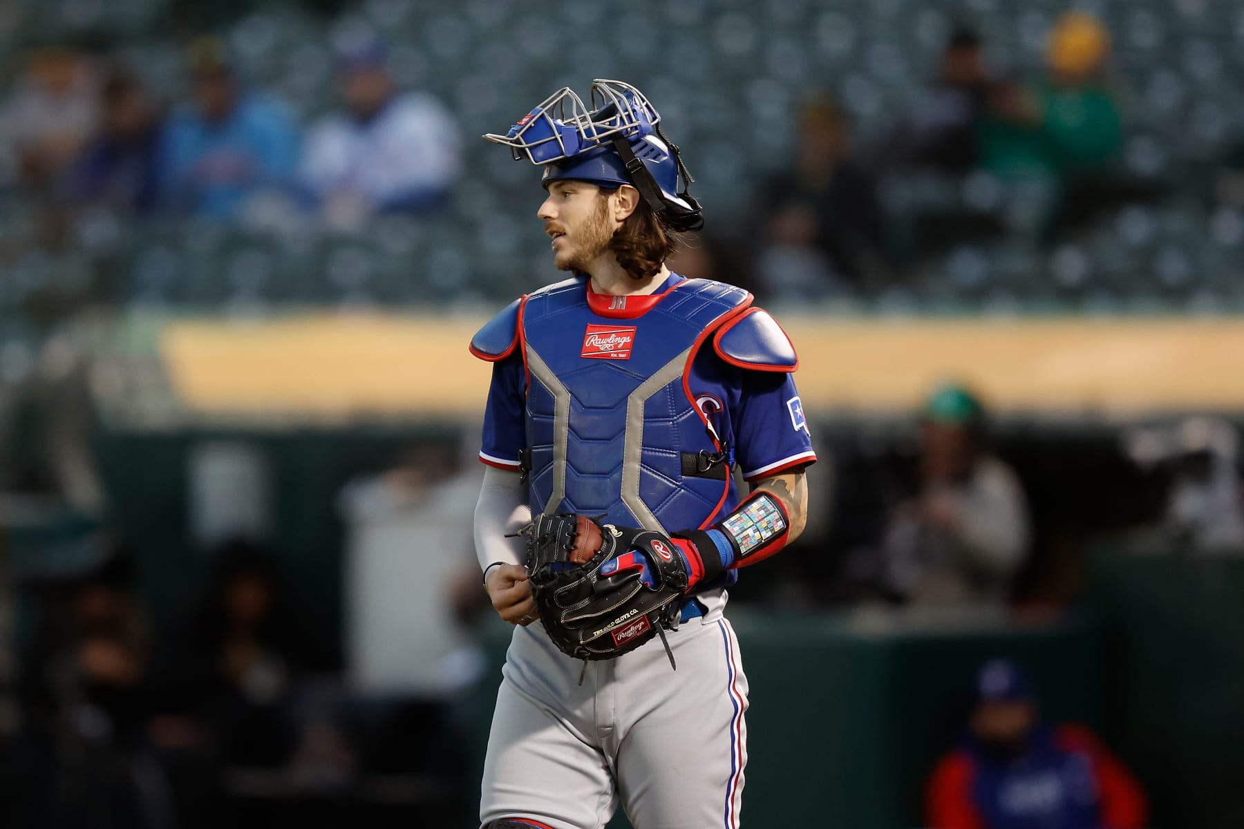 OAKLAND, CALIFORNIA - MAY 11: Catcher Jonah Heim #28 of the Texas Rangers look on during the game against the Oakland Athletics at RingCentral Coliseum on May 11, 2023 in Oakland, California. (Photo by Lachlan Cunningham/Getty Images)