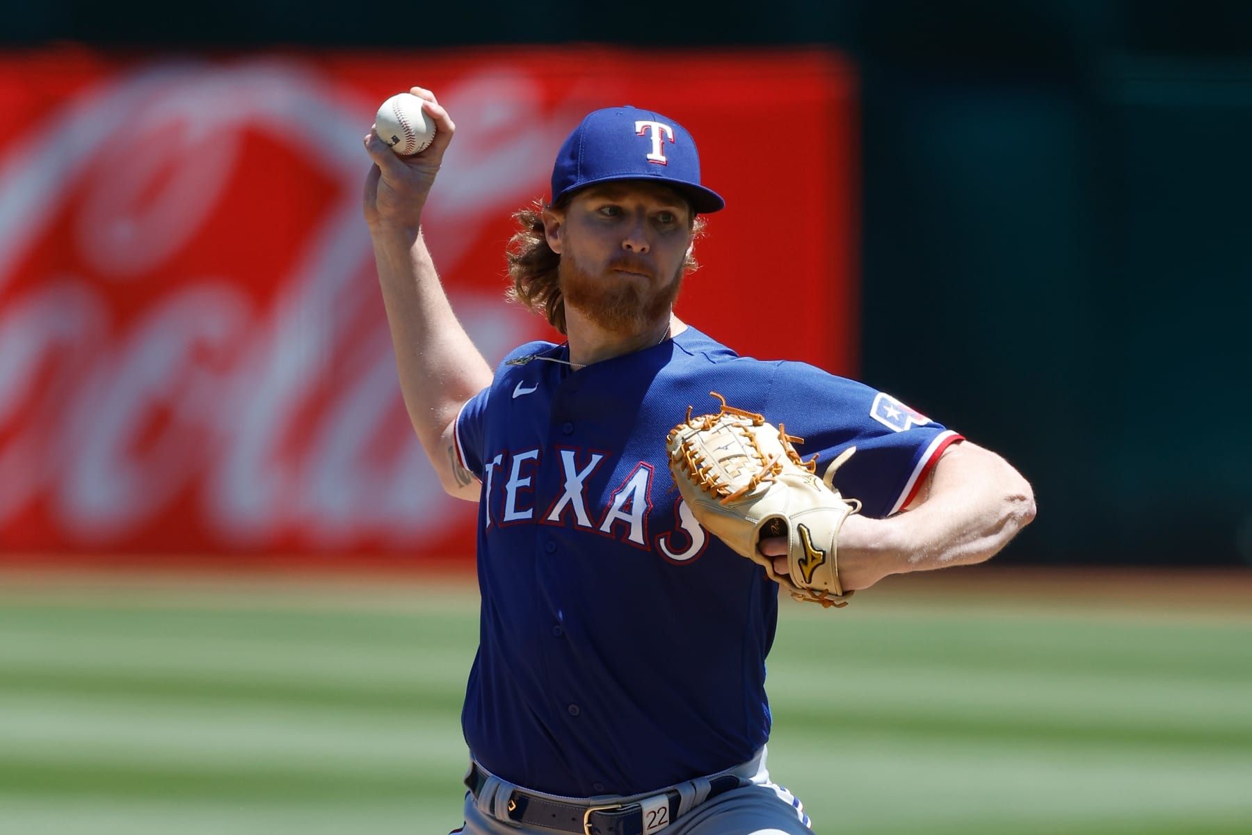 OAKLAND, CALIFORNIA - MAY 13: Jon Gray #22 of the Texas Rangers pitches against the Oakland Athletics at RingCentral Coliseum on May 13, 2023 in Oakland, California. (Photo by Lachlan Cunningham/Getty Images)