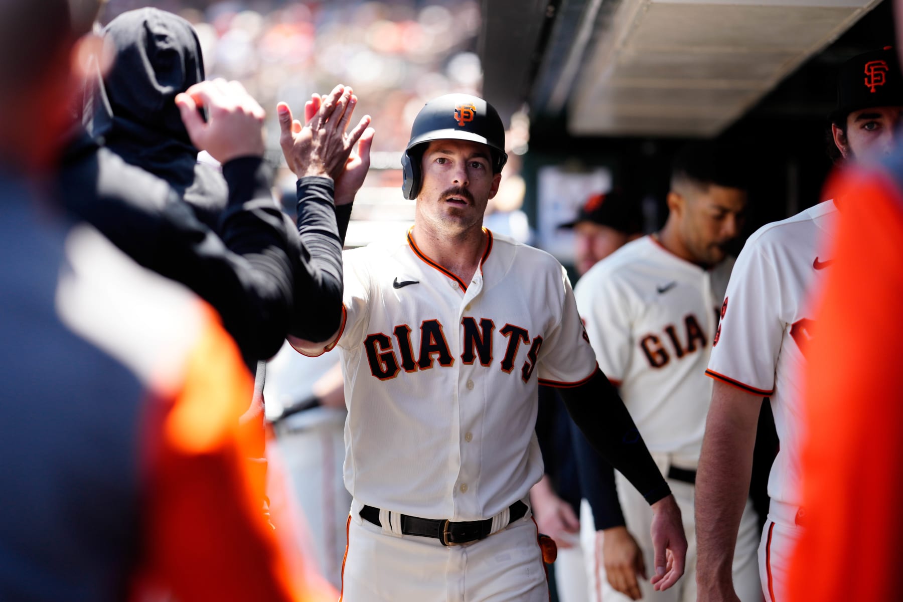 SAN FRANCISCO, CALIFORNIA - MAY 31: Mike Yastrzemski, #5 of the San Francisco Giants, celebrates in the dugout after scoring against the Pittsburgh Pirates at Oracle Park on May 31, 2023 in San Francisco, California. (Photo by Suzanna Mitchell/San Francisco Giants/Getty Images)