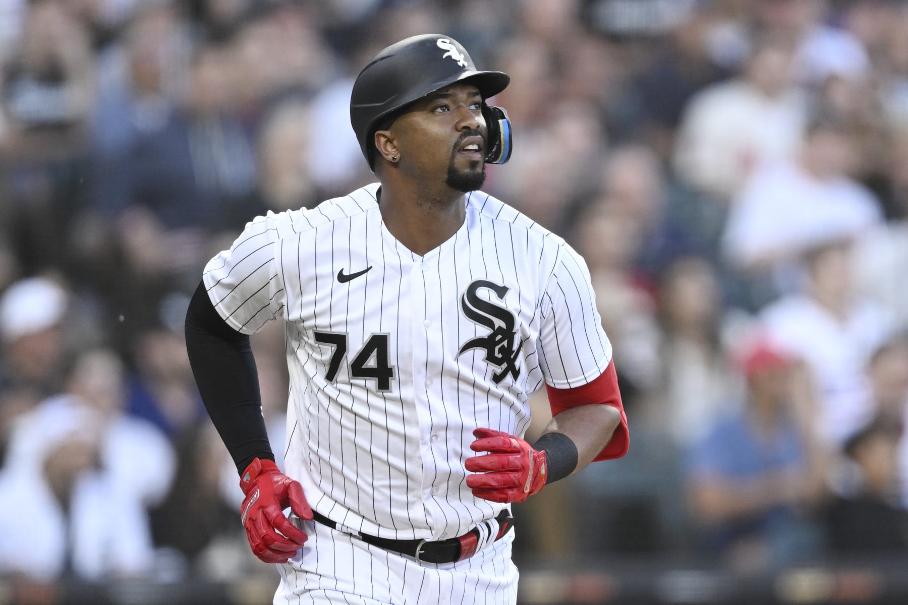 CHICAGO, ILLINOIS - MAY 30: Eloy Jimenez #74 of the Chicago White Sox hits a sacrifice fly in the first inning against the Los Angeles Angels at Guaranteed Rate Field on May 30, 2023 in Chicago, Illinois. (Photo by Quinn Harris/Getty Images)