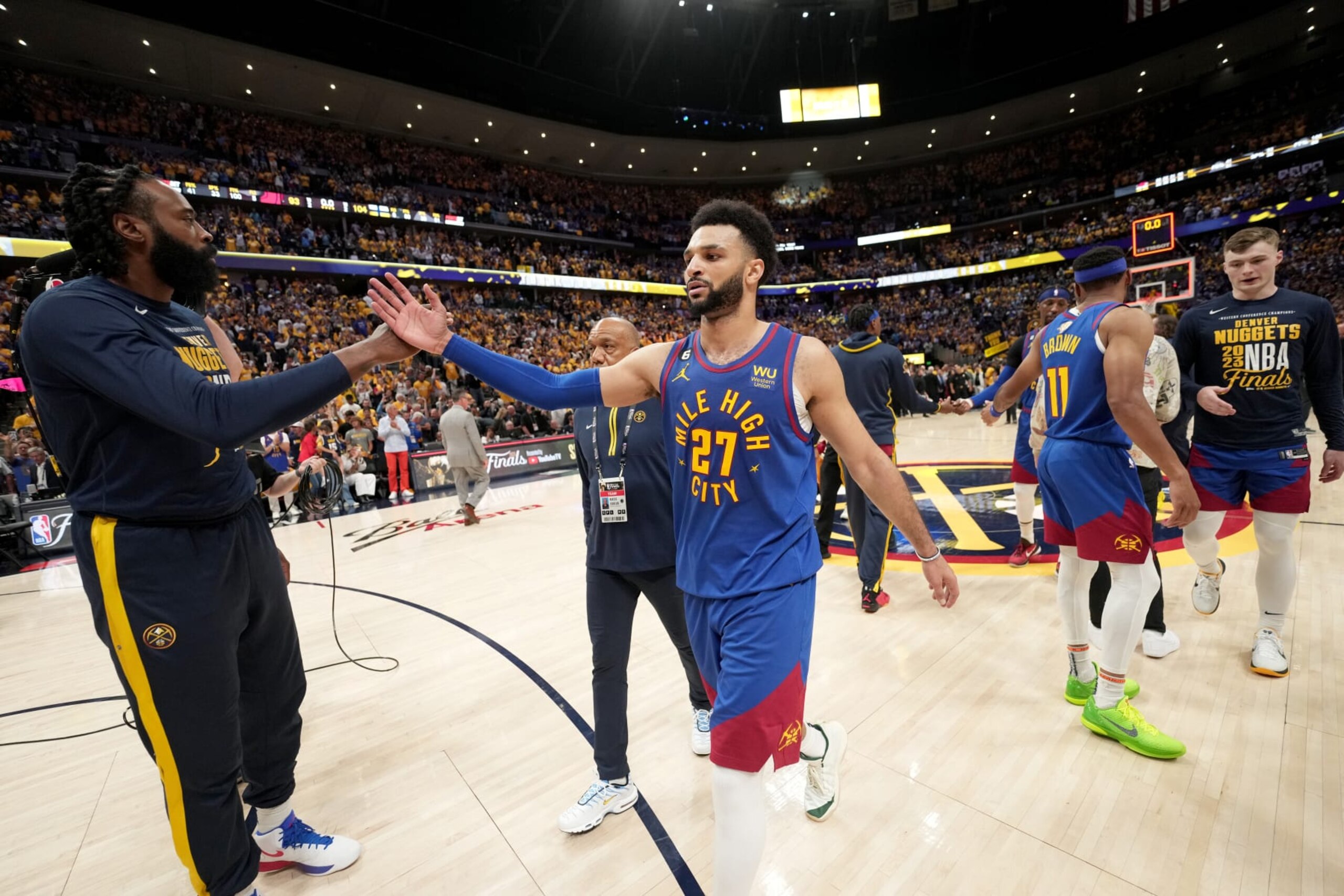 DENVER, CO - JUNE 1: Jamal Murray #27 of the Denver Nuggets high fives DeAndre Jordan #6 of the Denver Nuggets after Game One of the 2023 NBA Finals against the Miami Heat on June 1, 2023 at the Ball Arena in Denver, Colorado. NOTE TO USER: User expressly acknowledges and agrees that, by downloading and/or using this Photograph, user is consenting to the terms and conditions of the Getty Images License Agreement. Mandatory Copyright Notice: Copyright 2023 NBAE (Photo by Jesse D. Garrabrant/NBAE via Getty Images)
