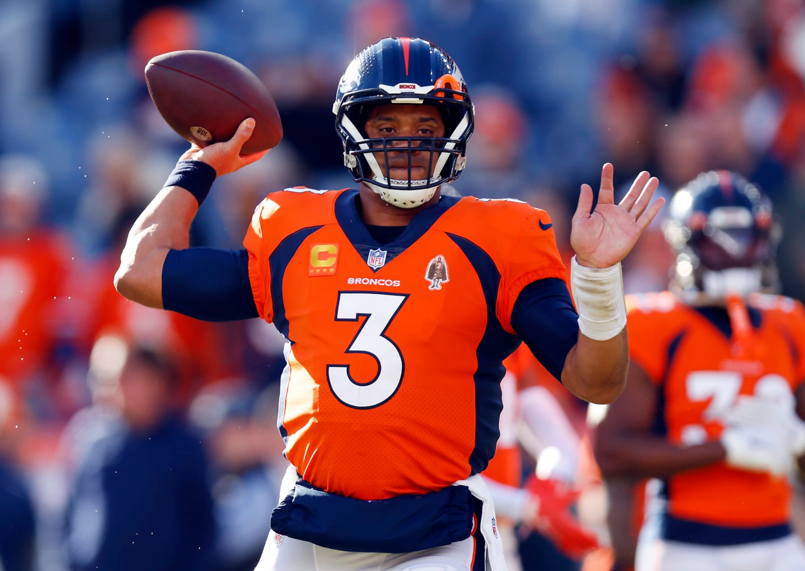 DENVER, COLORADO - JANUARY 08: Russell Wilson #3 of the Denver Broncos warms up prior to a game against the Los Angeles Chargers at Empower Field At Mile High on January 08, 2023 in Denver, Colorado. (Photo by Justin Edmonds/Getty Images)