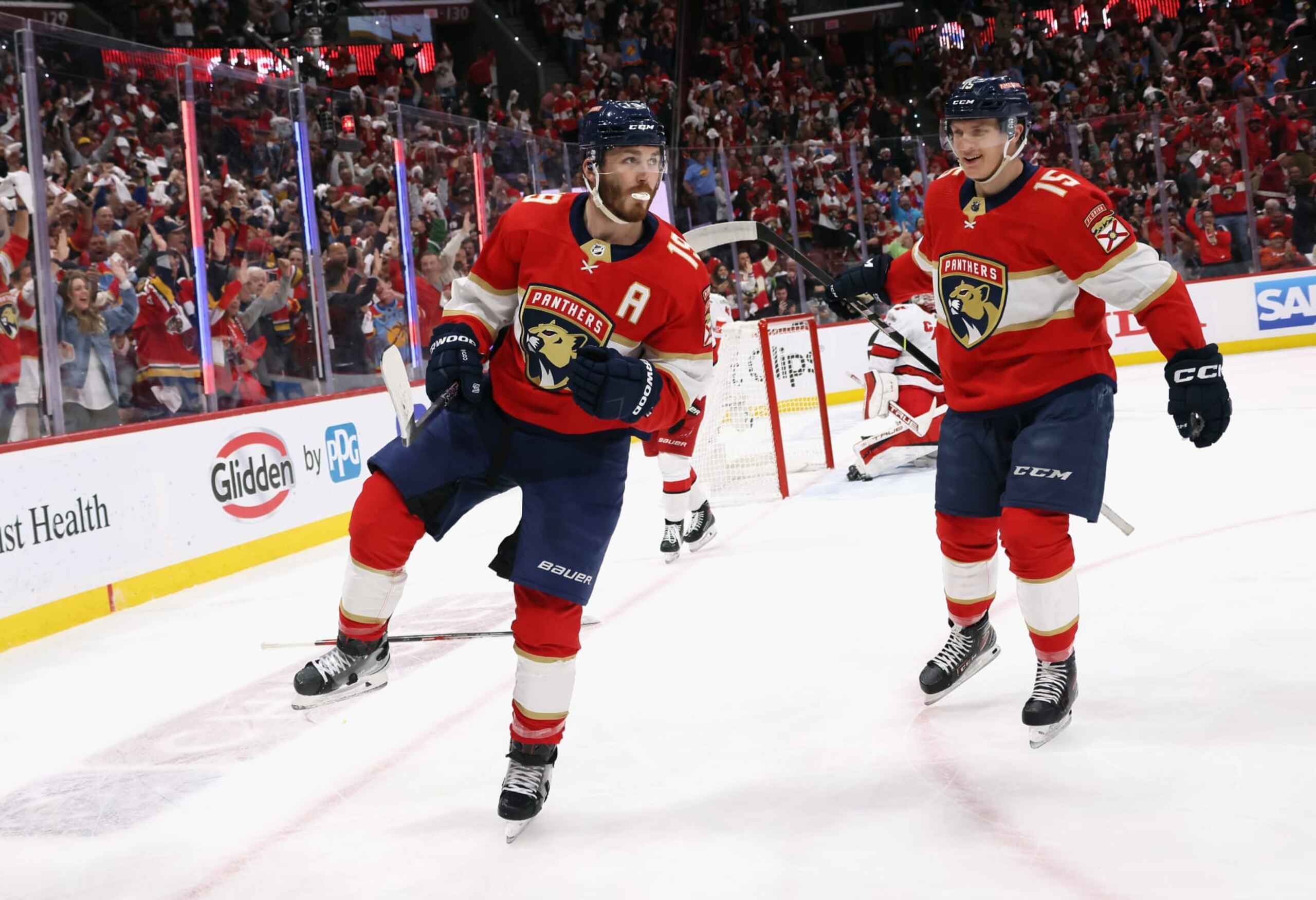 Matthew Tkachuk (left)