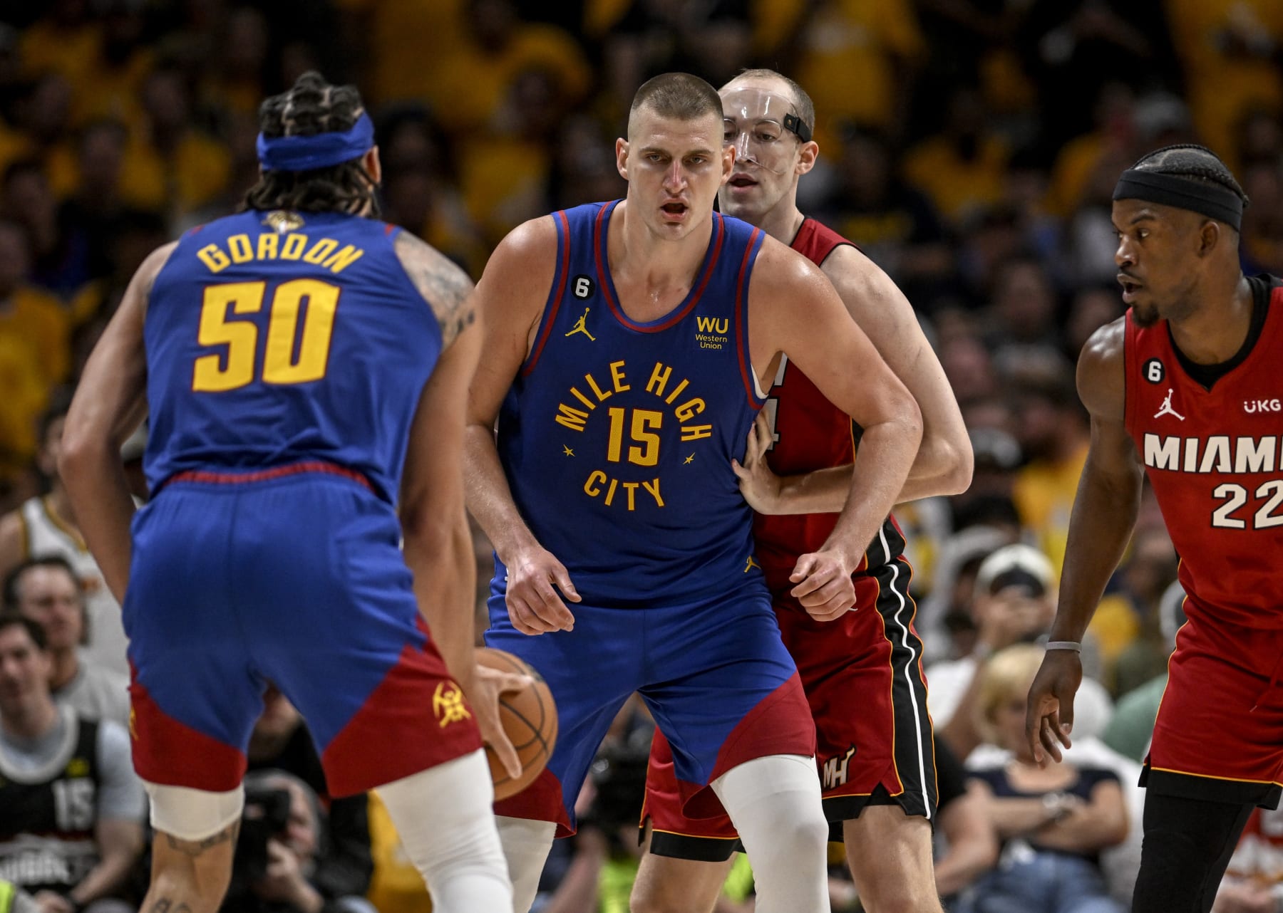 DENVER, CO - JUNE 1: Nikola Jokic (15) of the Denver Nuggets waits for a pass from Aaron Gordon (50) before abusing Cody Zeller (44) of the Miami Heat in the post during the second quarter of the NBA Finals game 1 at Ball Arena in Denver on Thursday, June 1, 2023. (Photo by AAron Ontiveroz/The Denver Post)