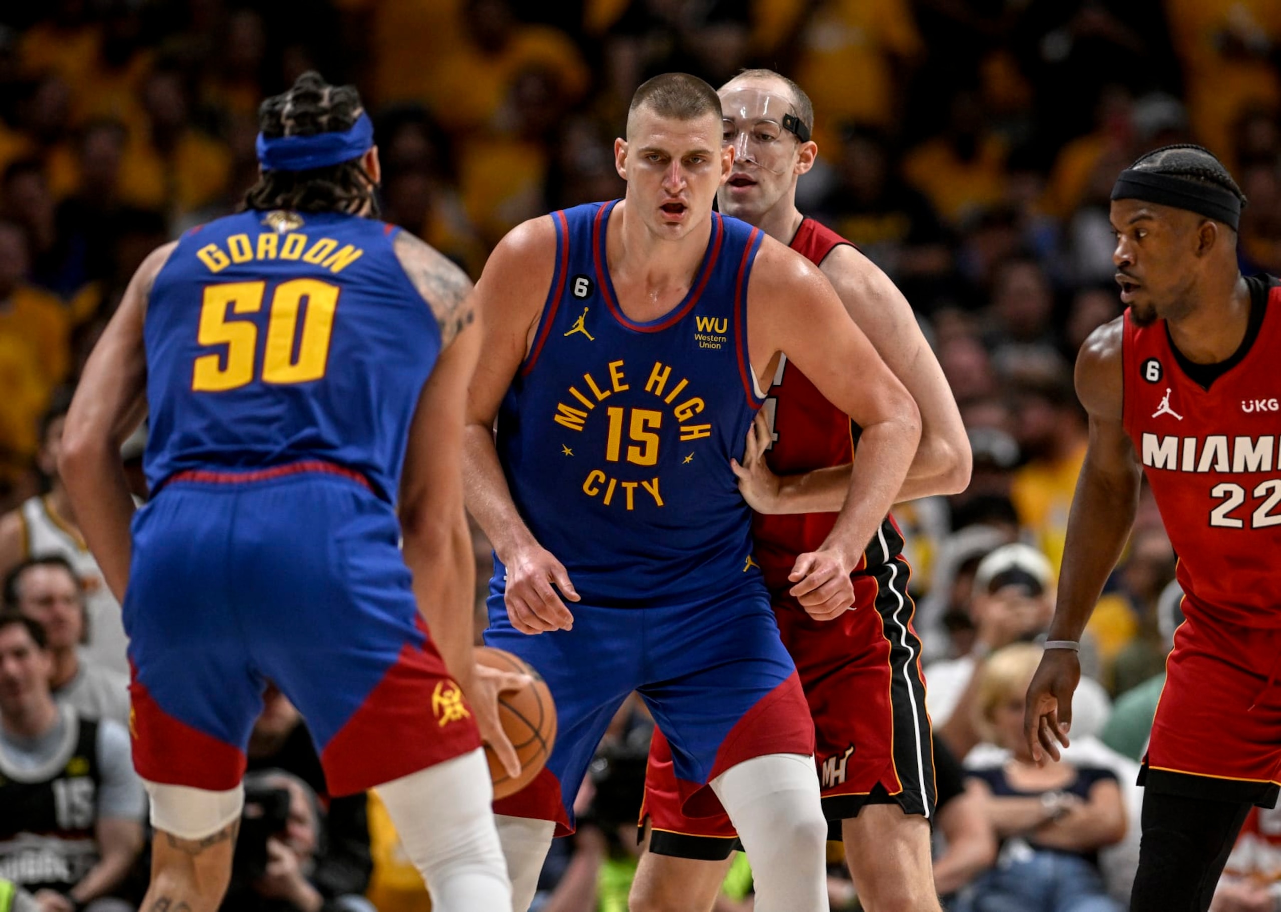 DENVER, CO - JUNE 1: Nikola Jokic (15) of the Denver Nuggets waits for a pass from Aaron Gordon (50) before abusing Cody Zeller (44) of the Miami Heat in the post during the second quarter of the NBA Finals game 1 at Ball Arena in Denver on Thursday, June 1, 2023. (Photo by AAron Ontiveroz/The Denver Post)