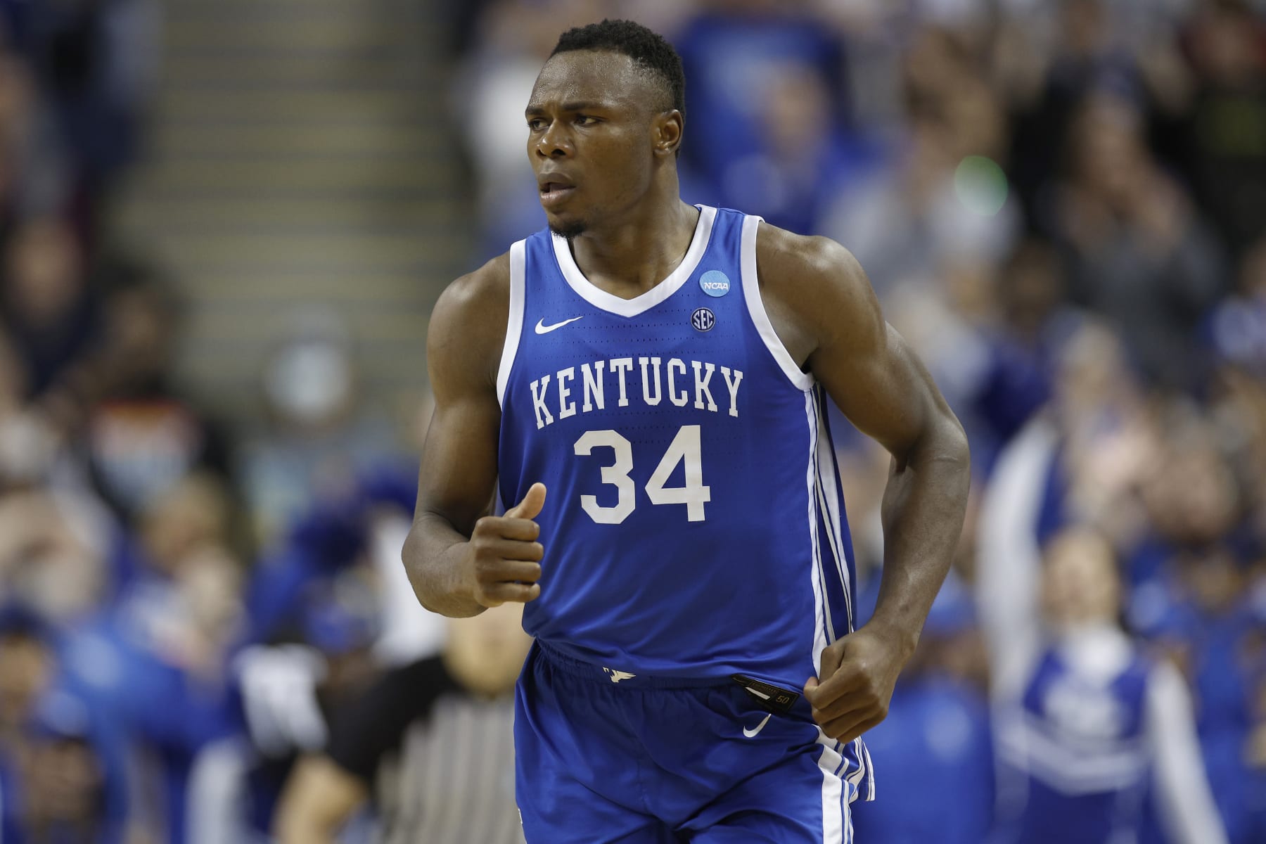 GREENSBORO, NORTH CAROLINA - MARCH 19: Oscar Tshiebwe #34 of the Kentucky Wildcats reacts during the second half against the Kansas State Wildcats in the second round of the NCAA Men's Basketball Tournament at The Fieldhouse at Greensboro Coliseum on March 19, 2023 in Greensboro, North Carolina. (Photo by Jared C. Tilton/Getty Images) GREENSBORO, NORTH CAROLINA - MARCH 19: Oscar Tshiebwe #34 of the Kentucky Wildcats reacts during the second half against the Kansas State Wildcats in the second round of the NCAA Men's Basketball Tournament at The Fieldhouse at Greensboro Coliseum on March 19, 2023 in Greensboro, North Carolina. (Photo by Jared C. Tilton/Getty Images)