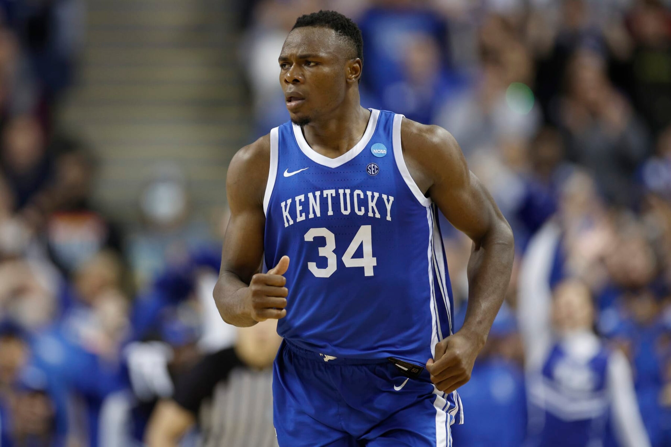 GREENSBORO, NORTH CAROLINA - MARCH 19: Oscar Tshiebwe #34 of the Kentucky Wildcats reacts during the second half against the Kansas State Wildcats in the second round of the NCAA Men's Basketball Tournament at The Fieldhouse at Greensboro Coliseum on March 19, 2023 in Greensboro, North Carolina. (Photo by Jared C. Tilton/Getty Images)