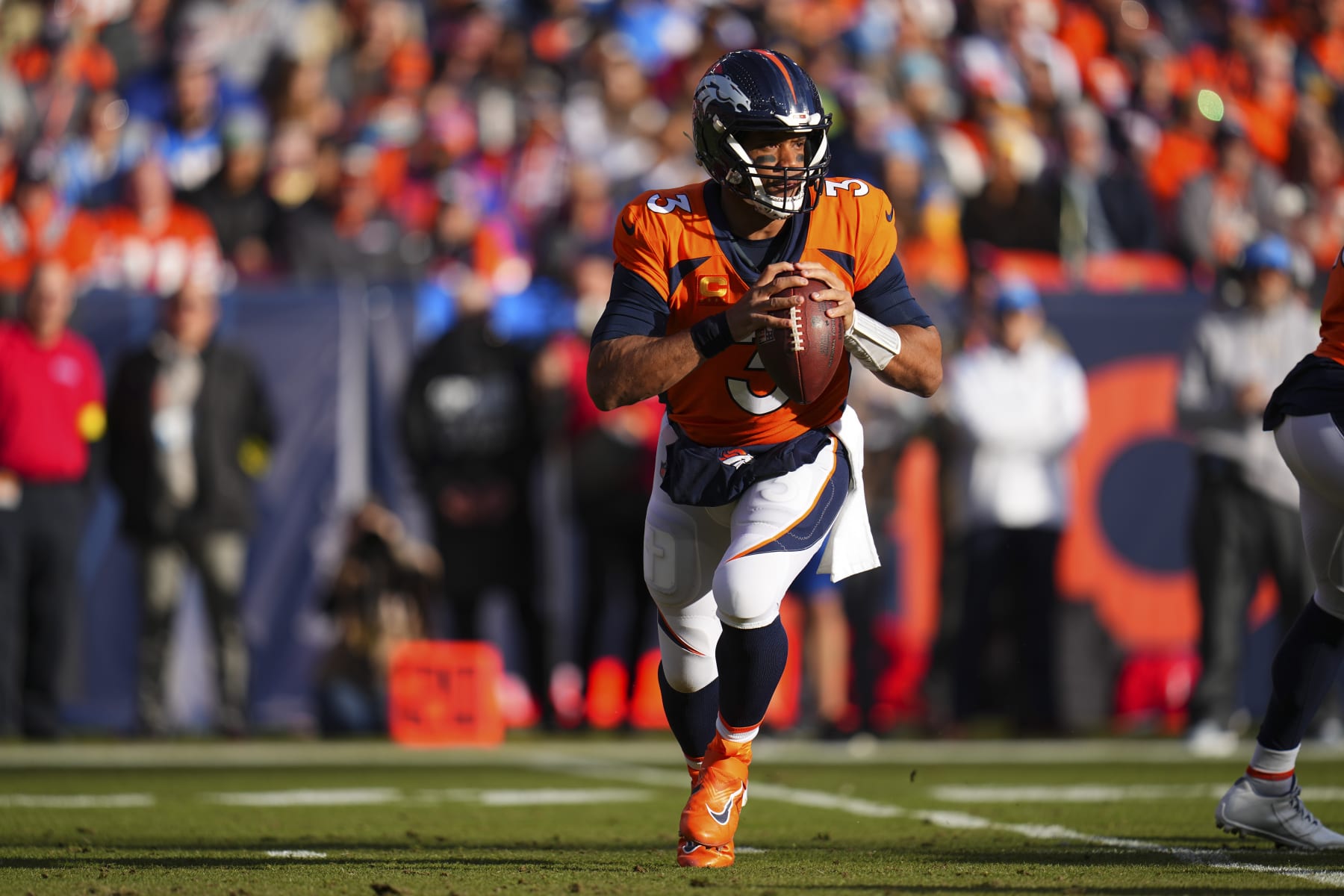 Denver Broncos quarterback Russell Wilson (3) during an NFL football game against the Los Angeles Chargers, Sunday, Jan. 8, 2023, in Denver. (AP Photo/Jack Dempsey)