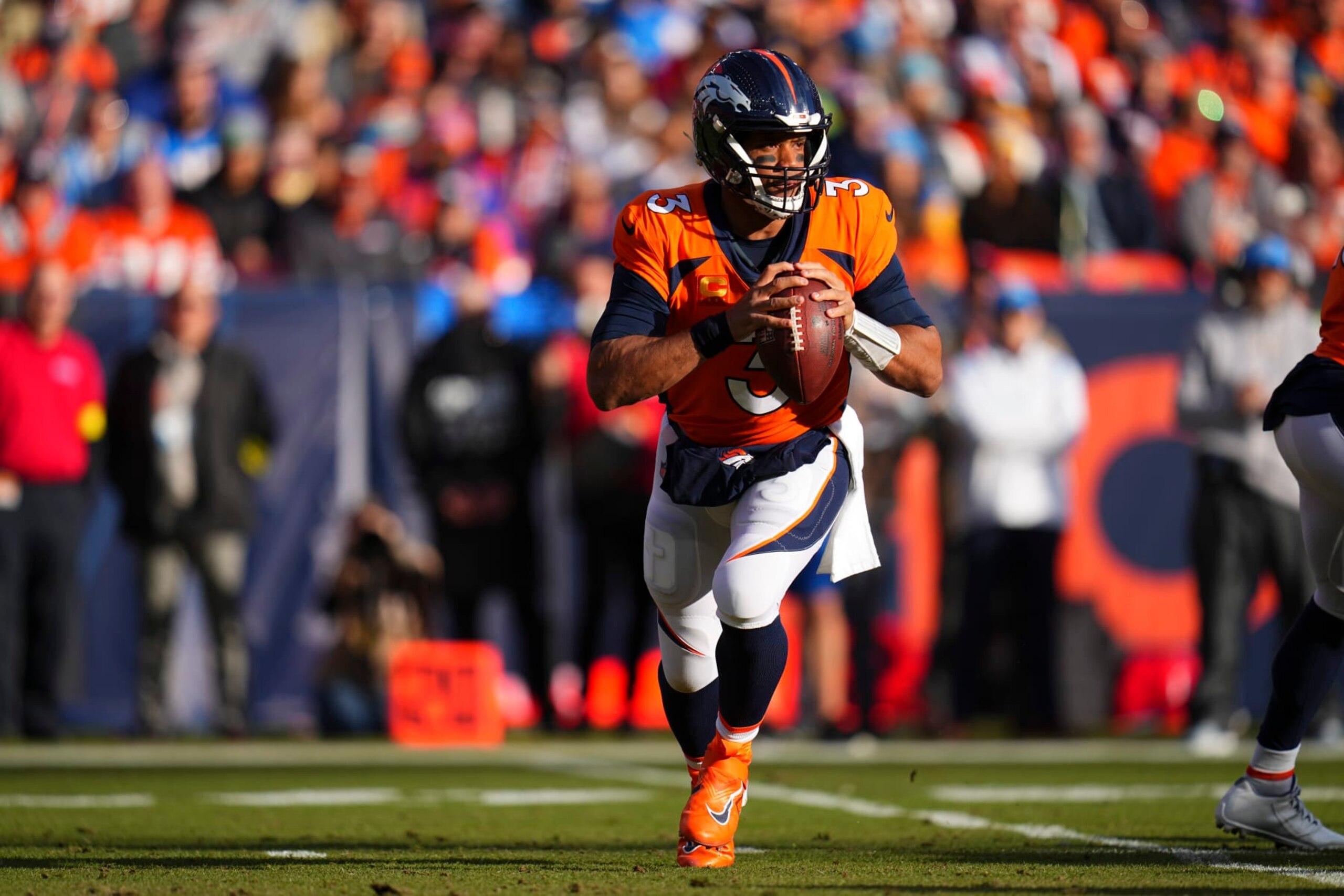 Denver Broncos quarterback Russell Wilson (3) during an NFL football game against the Los Angeles Chargers, Sunday, Jan. 8, 2023, in Denver. (AP Photo/Jack Dempsey)