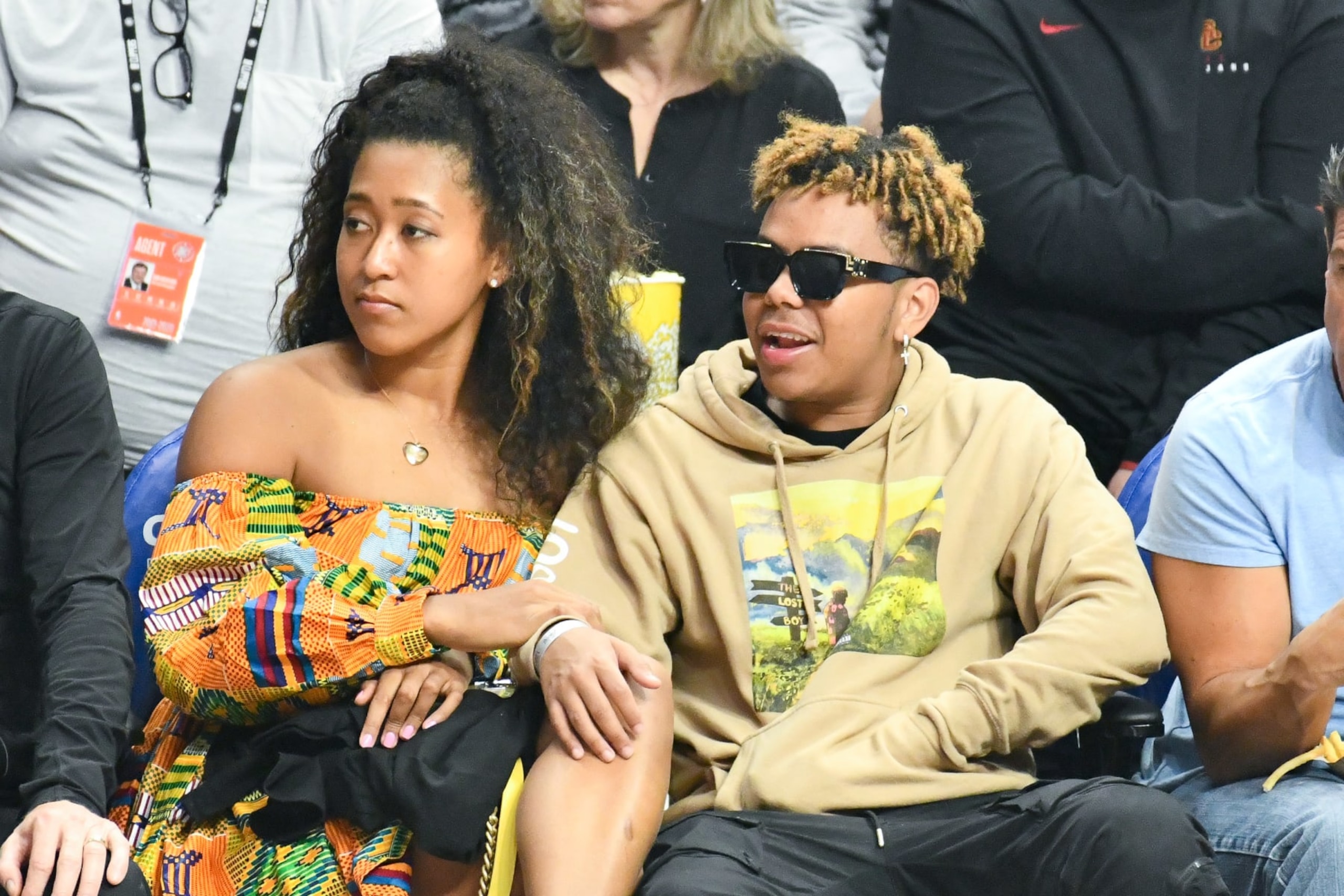LOS ANGELES, CALIFORNIA - DECEMBER 01: Naomi Osaka and YBN Cordae attend a basketball game between the Los Angeles Clippers and the Washington Wizards at Staples Center on December 01, 2019 in Los Angeles, California. (Photo by Allen Berezovsky/Getty Images)