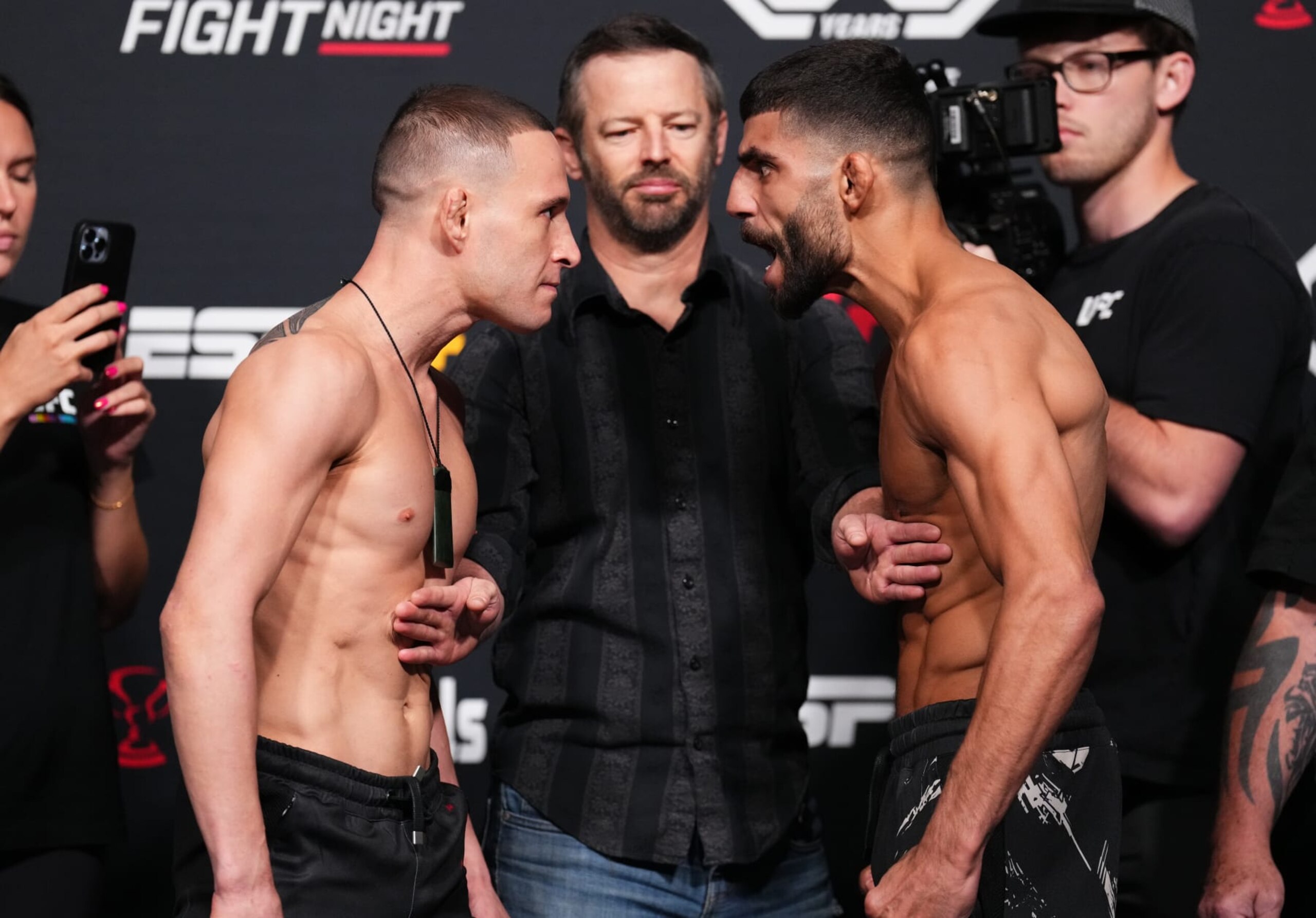 LAS VEGAS, NEVADA - JUNE 02: (L-R) Opponents Kai Kara-France of New Zealand and Amir Albazi of Iraq face off during the UFC Fight Night weigh-in at UFC APEX on June 02, 2023 in Las Vegas, Nevada. (Photo by Chris Unger/Zuffa LLC via Getty Images) LAS VEGAS, NEVADA - JUNE 02: (L-R) Opponents Kai Kara-France of New Zealand and Amir Albazi of Iraq face off during the UFC Fight Night weigh-in at UFC APEX on June 02, 2023 in Las Vegas, Nevada. (Photo by Chris Unger/Zuffa LLC via Getty Images)