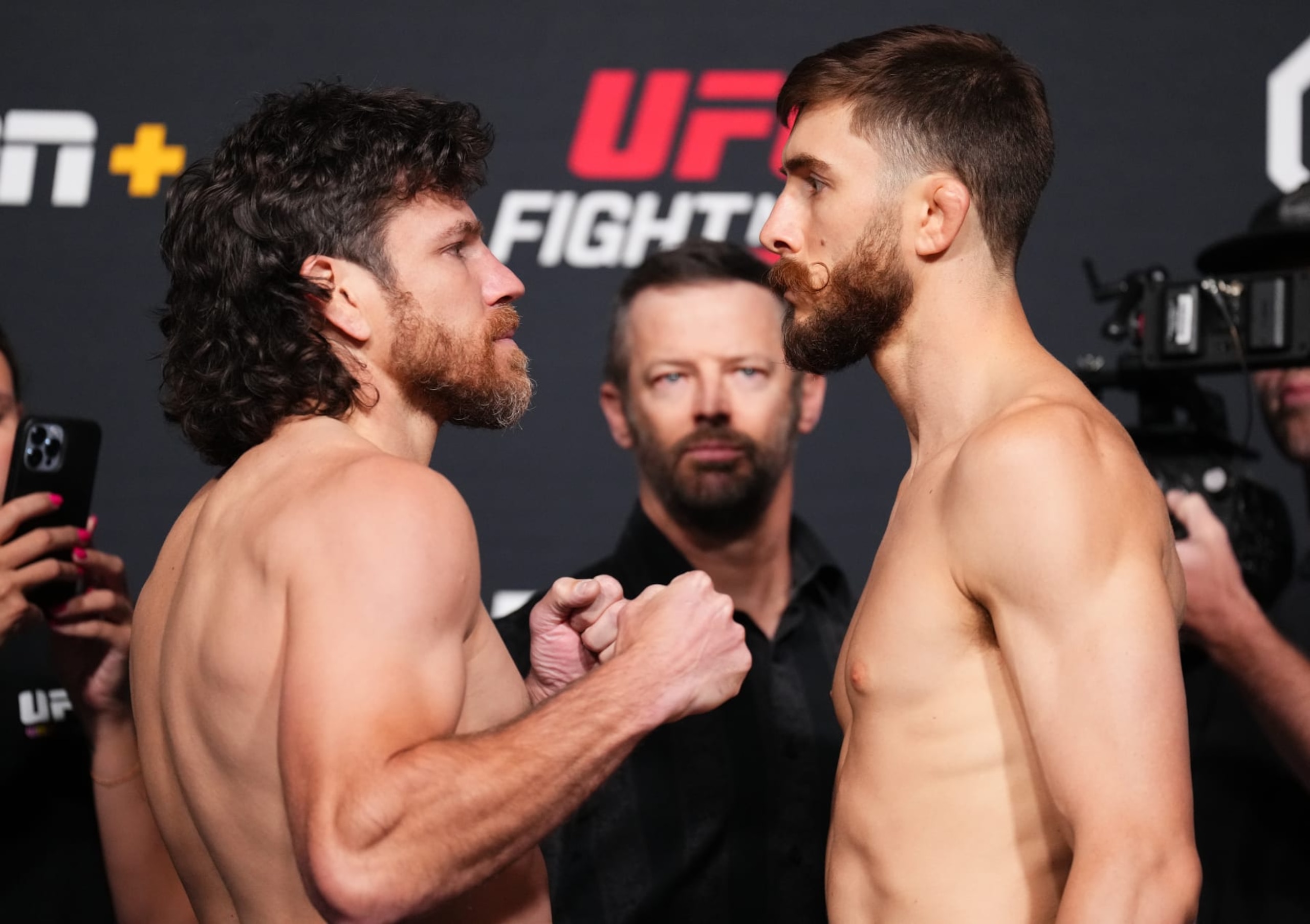 LAS VEGAS, NEVADA - JUNE 02: (L-R) Opponents Jim Miller and Jesse Butler face off during the UFC Fight Night weigh-in at UFC APEX on June 02, 2023 in Las Vegas, Nevada. (Photo by Chris Unger/Zuffa LLC via Getty Images) LAS VEGAS, NEVADA - JUNE 02: (L-R) Opponents Jim Miller and Jesse Butler face off during the UFC Fight Night weigh-in at UFC APEX on June 02, 2023 in Las Vegas, Nevada. (Photo by Chris Unger/Zuffa LLC via Getty Images)