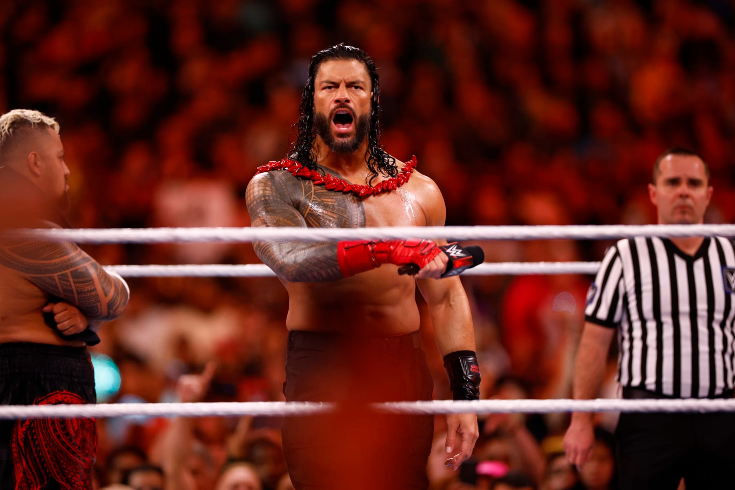 INGLEWOOD, CALIFORNIA - APRIL 02:  (L-R) Cody Rhodes wrestles Roman Reigns for Undisputed WWE Universal Title Match during WrestleMania Goes Hollywood at SoFi Stadium on April 02, 2023 in Inglewood, California.
 (Photo by Ronald Martinez/Getty Images)