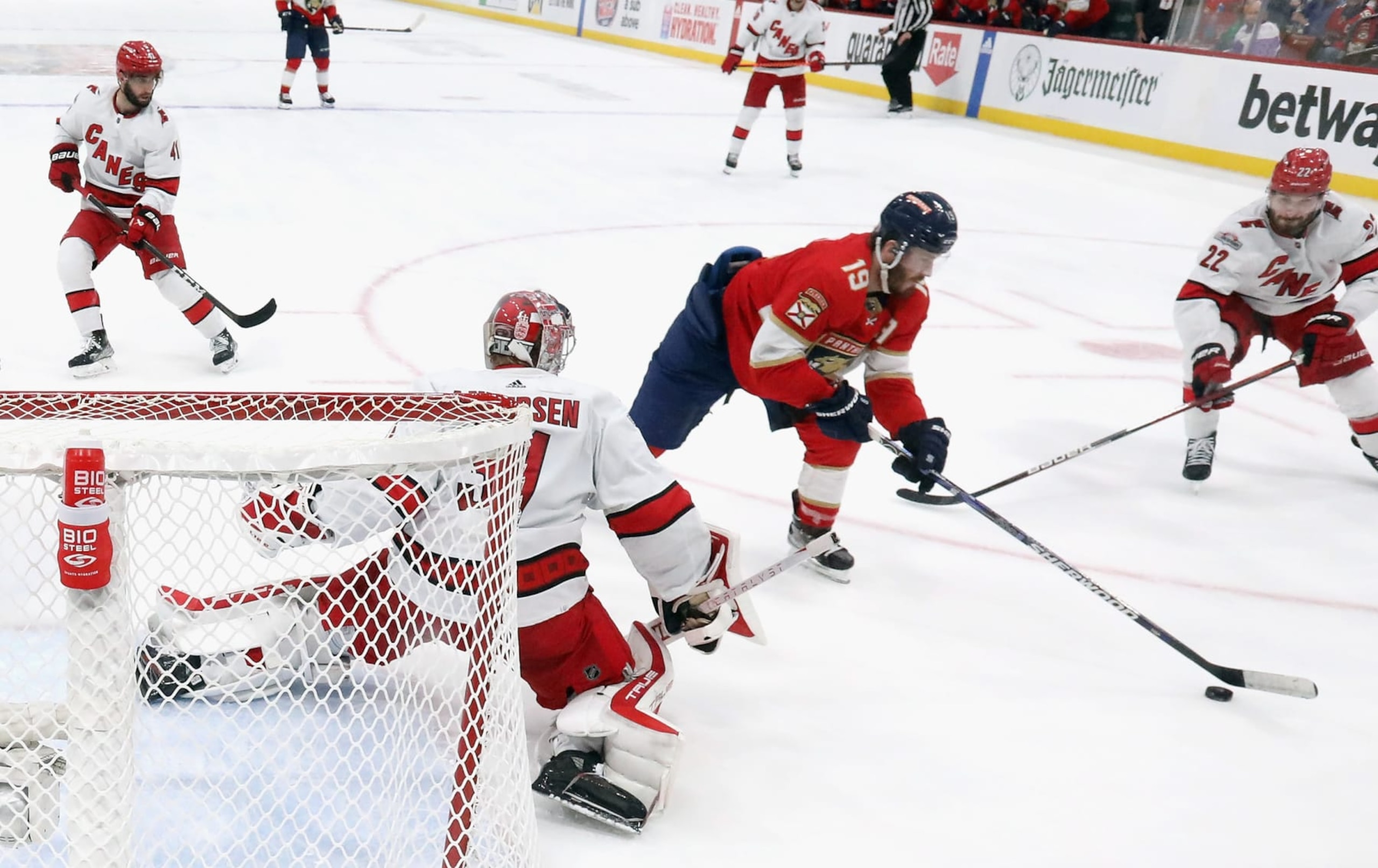 SUNRISE, FLORIDA - MAY 24: Matthew Tkachuk #19 of the Florida Panthers corrals the puck against Frederik Andersen #31 of the Carolina Hurricanes in Game Four of the Eastern Conference Finals of the 2023 Stanley Cup Playoffs at FLA Live Arena on May 24, 2023 in Sunrise, Florida. The Panthers defeated the Hurricanes 4-3 to take the series 4-0. (Photo by Bruce Bennett/Getty Images)