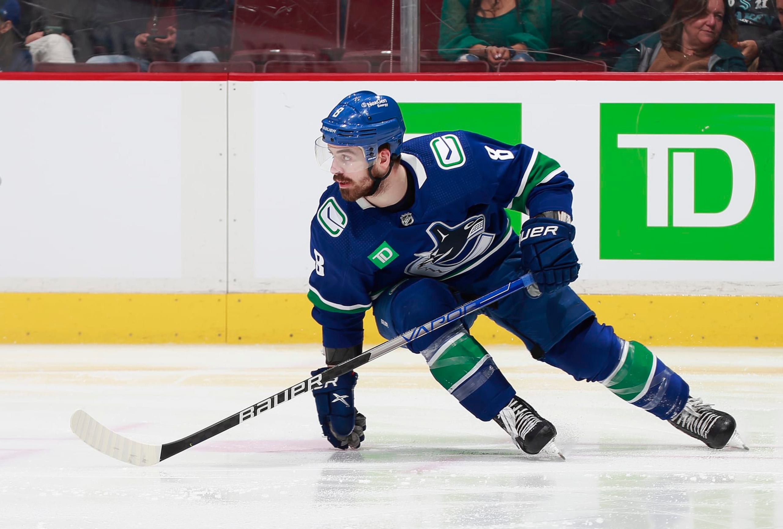 VANCOUVER, CANADA - APRIL 4: Conor Garland #8 of the Vancouver Canucks skates up ice during their NHL game against the Seattle Kraken at Rogers Arena April 4, 2023 in Vancouver, British Columbia, Canada.  (Photo by Jeff Vinnick/NHLI via Getty Images)