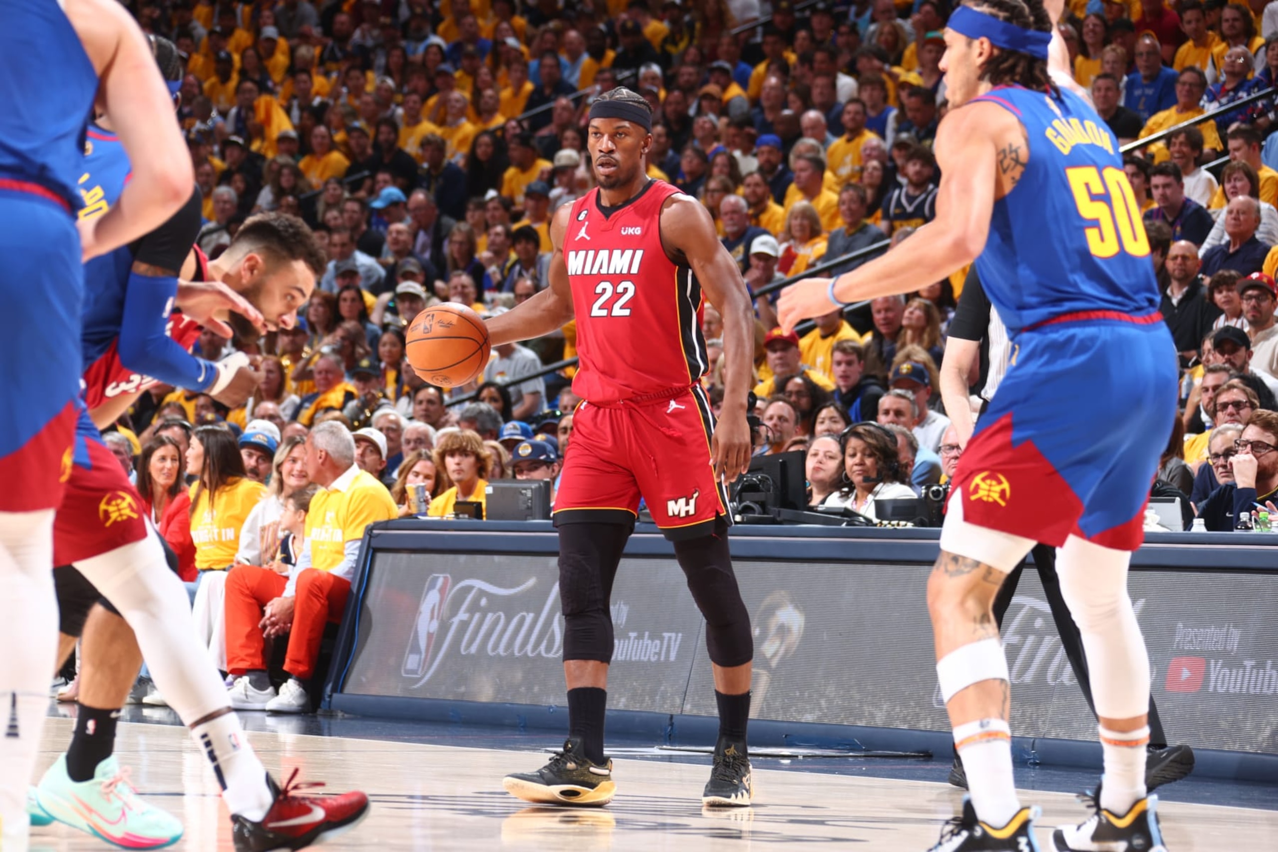 DENVER, CO - JUNE 1: Jimmy Butler #22 of the Miami Heat dribbles the ball during Game One of the 2023 NBA Finals against the Denver Nuggets on June 1, 2023 at the Ball Arena in Denver, Colorado. NOTE TO USER: User expressly acknowledges and agrees that, by downloading and/or using this Photograph, user is consenting to the terms and conditions of the Getty Images License Agreement. Mandatory Copyright Notice: Copyright 2023 NBAE (Photo by Nathaniel S. Butler/NBAE via Getty Images)