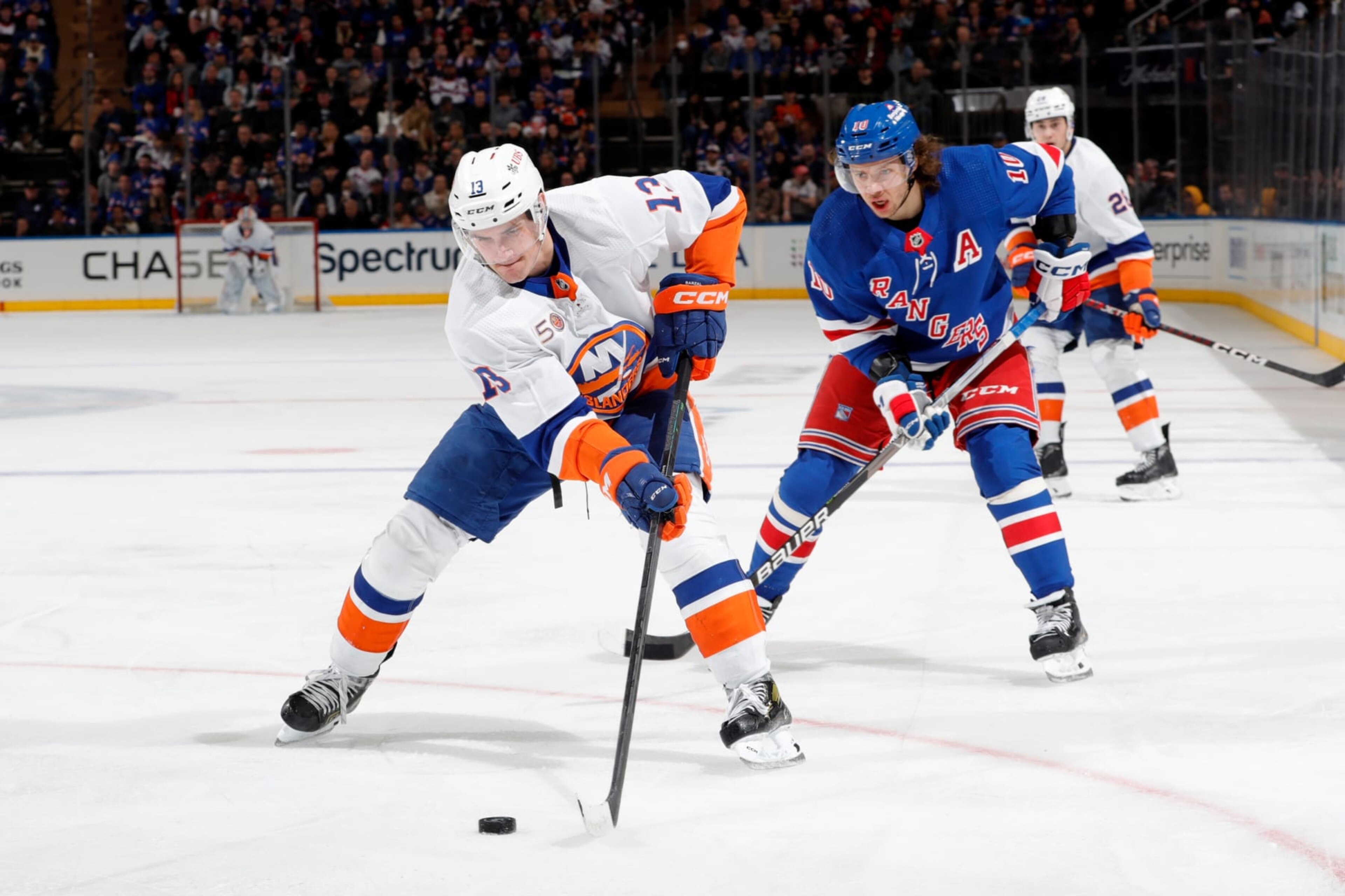 NEW YORK, NEW YORK - DECEMBER 22: Mathew Barzal #13 of the New York Islanders skates with the puck against the New York Rangers at Madison Square Garden on December 22, 2022 in New York City. (Photo by Jared Silber/NHLI via Getty Images) NEW YORK, NEW YORK - DECEMBER 22: Mathew Barzal #13 of the New York Islanders skates with the puck against the New York Rangers at Madison Square Garden on December 22, 2022 in New York City. (Photo by Jared Silber/NHLI via Getty Images)