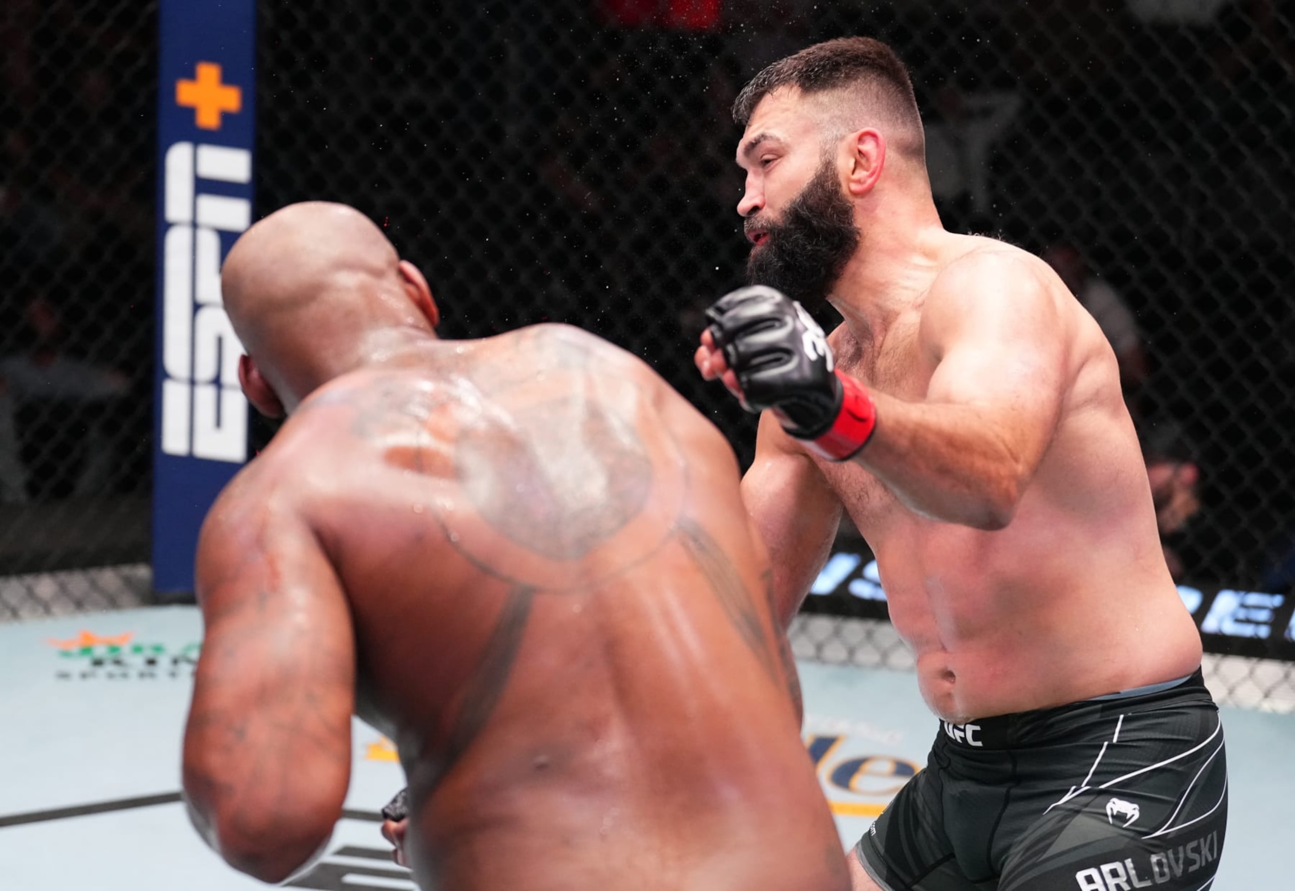 LAS VEGAS, NEVADA - JUNE 03: (L-R) Don'Tale Mayes drops Andrei Arlovski of Belarus in a heavyweight bout during the UFC Fight Night event at UFC APEX on June 03, 2023 in Las Vegas, Nevada. (Photo by Chris Unger/Zuffa LLC via Getty Images)