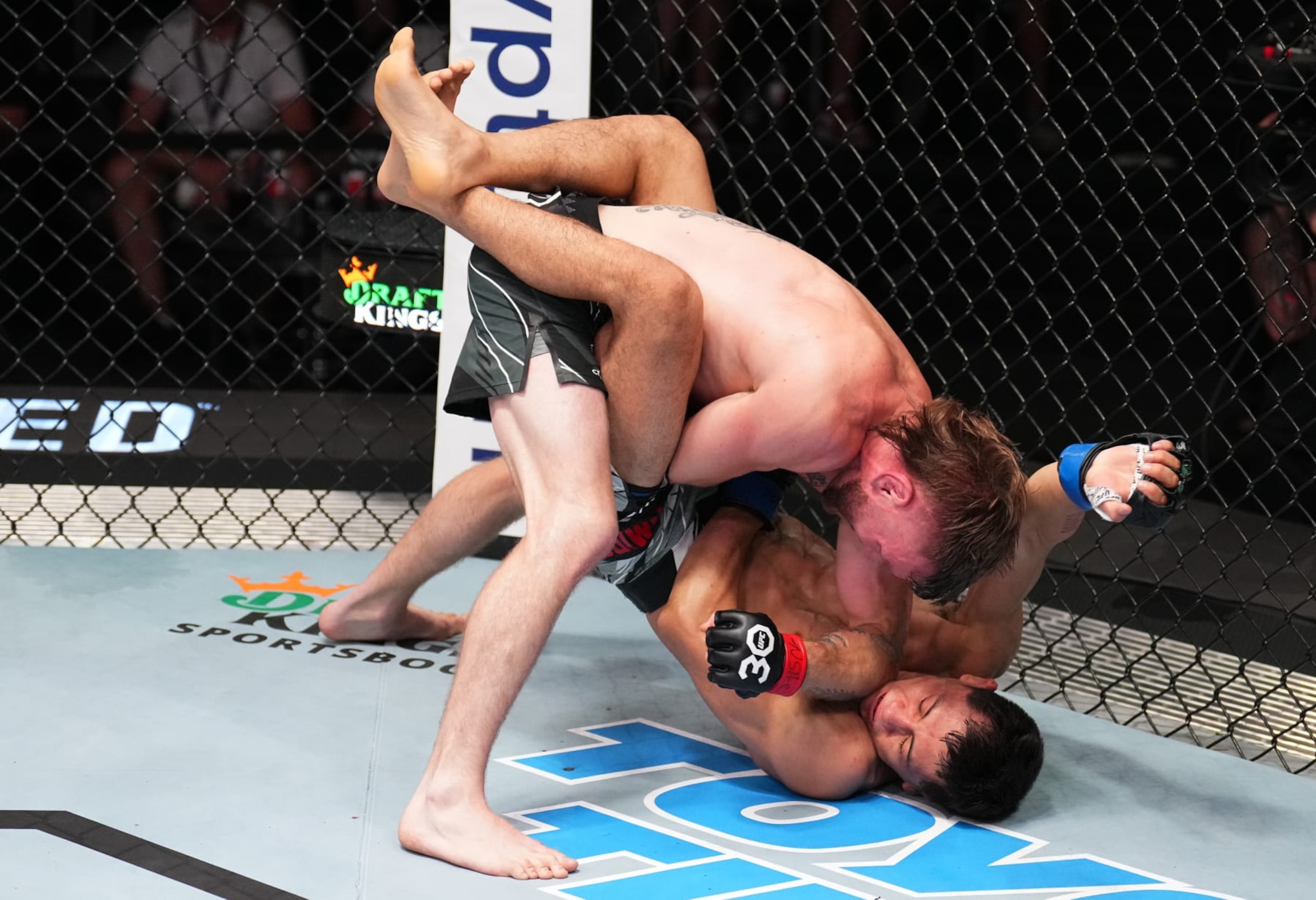 LAS VEGAS, NEVADA - JUNE 03: (L-R) Tim Elliott elbows Victor Altamirano of Mexico in a flyweight bout during the UFC Fight Night event at UFC APEX on June 03, 2023 in Las Vegas, Nevada. (Photo by Chris Unger/Zuffa LLC via Getty Images)