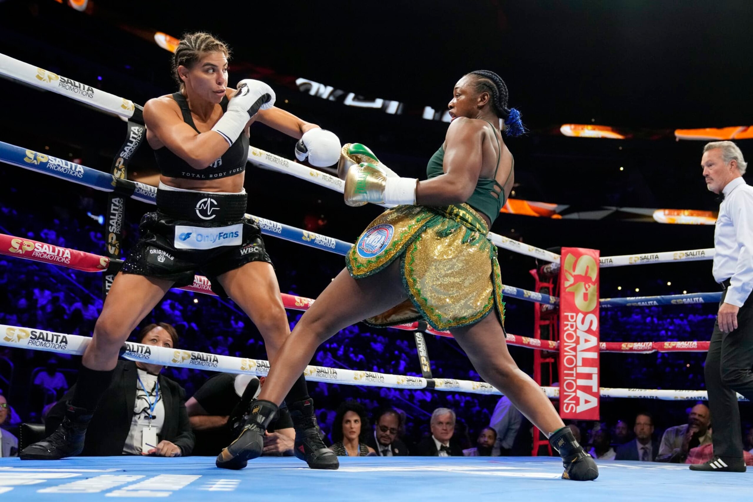 Claressa Shields, right, fights Maricela Cornejo during a middleweight boxing bout Saturday, June 3, 2023, in Detroit. (AP Photo/Carlos Osorio) Claressa Shields, right, fights Maricela Cornejo during a middleweight boxing bout Saturday, June 3, 2023, in Detroit. (AP Photo/Carlos Osorio)