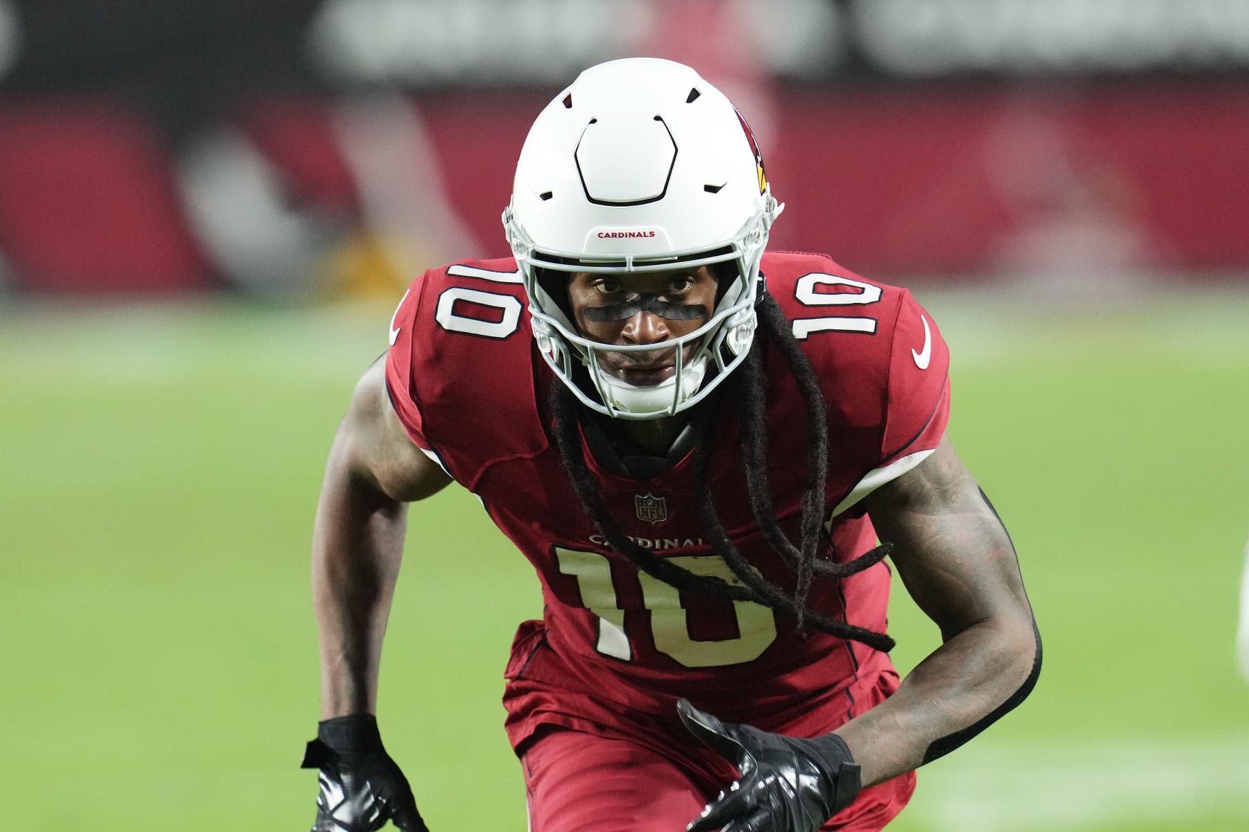 Arizona Cardinals wide receiver DeAndre Hopkins runs down field against the New England Patriots during the first half of an NFL football game in Glendale, Ariz., Monday, Dec. 12, 2022. (AP Photo/Ross D. Franklin)
