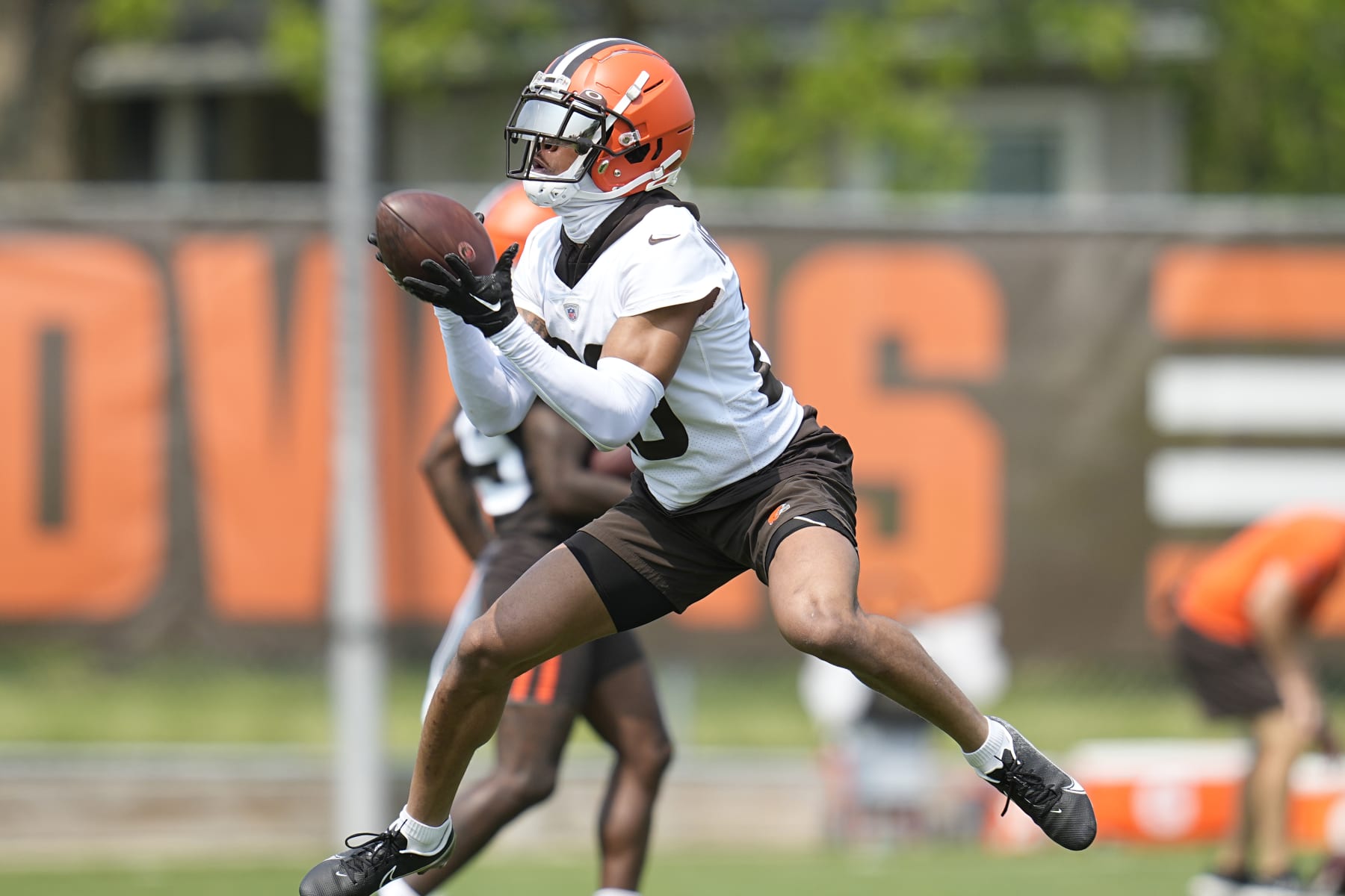 Cleveland Browns cornerback Greg Newsome II catches a pass during NFL football practice, Wednesday, May 24, 2023, in Berea, Ohio. (AP Photo/Sue Ogrocki)