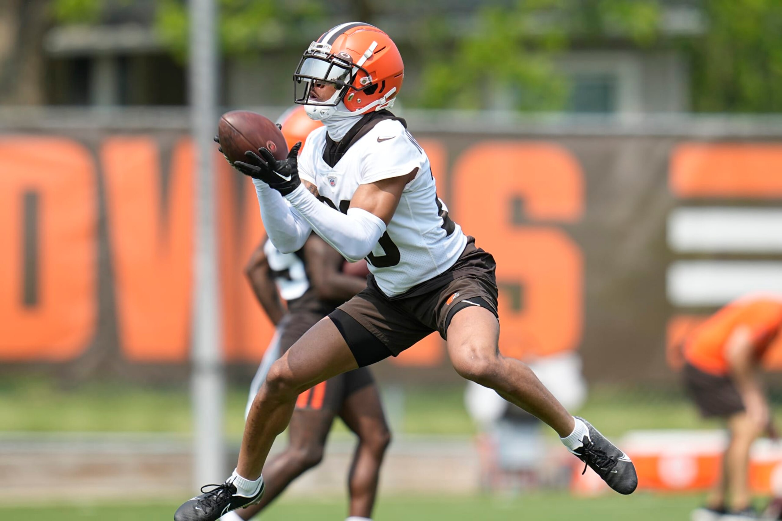 Cleveland Browns cornerback Greg Newsome II catches a pass during NFL football practice, Wednesday, May 24, 2023, in Berea, Ohio. (AP Photo/Sue Ogrocki)