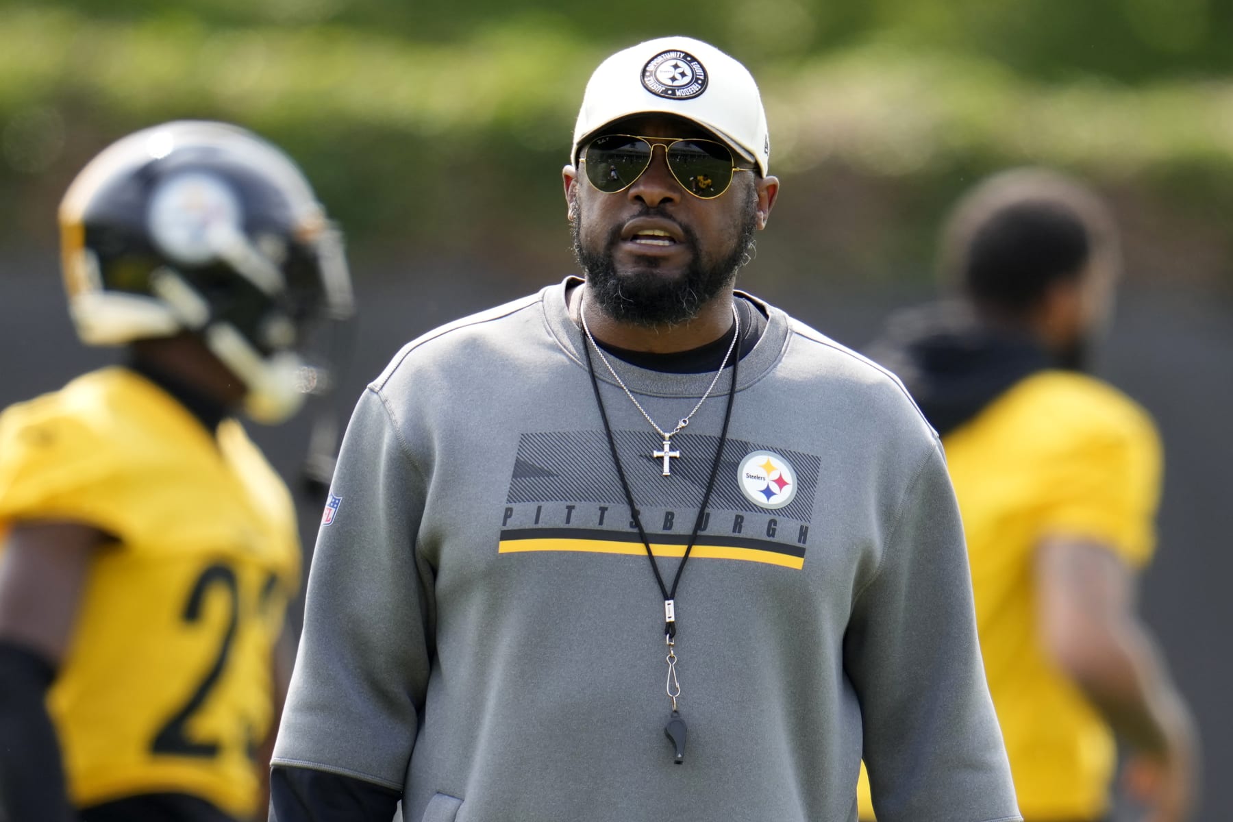 Pittsburgh Steelers head coach Mike Tomlin watches the NFL football team's OTA's in Pittsburgh Tuesday, May 23, 2023. (AP Photo/Gene J. Puskar)