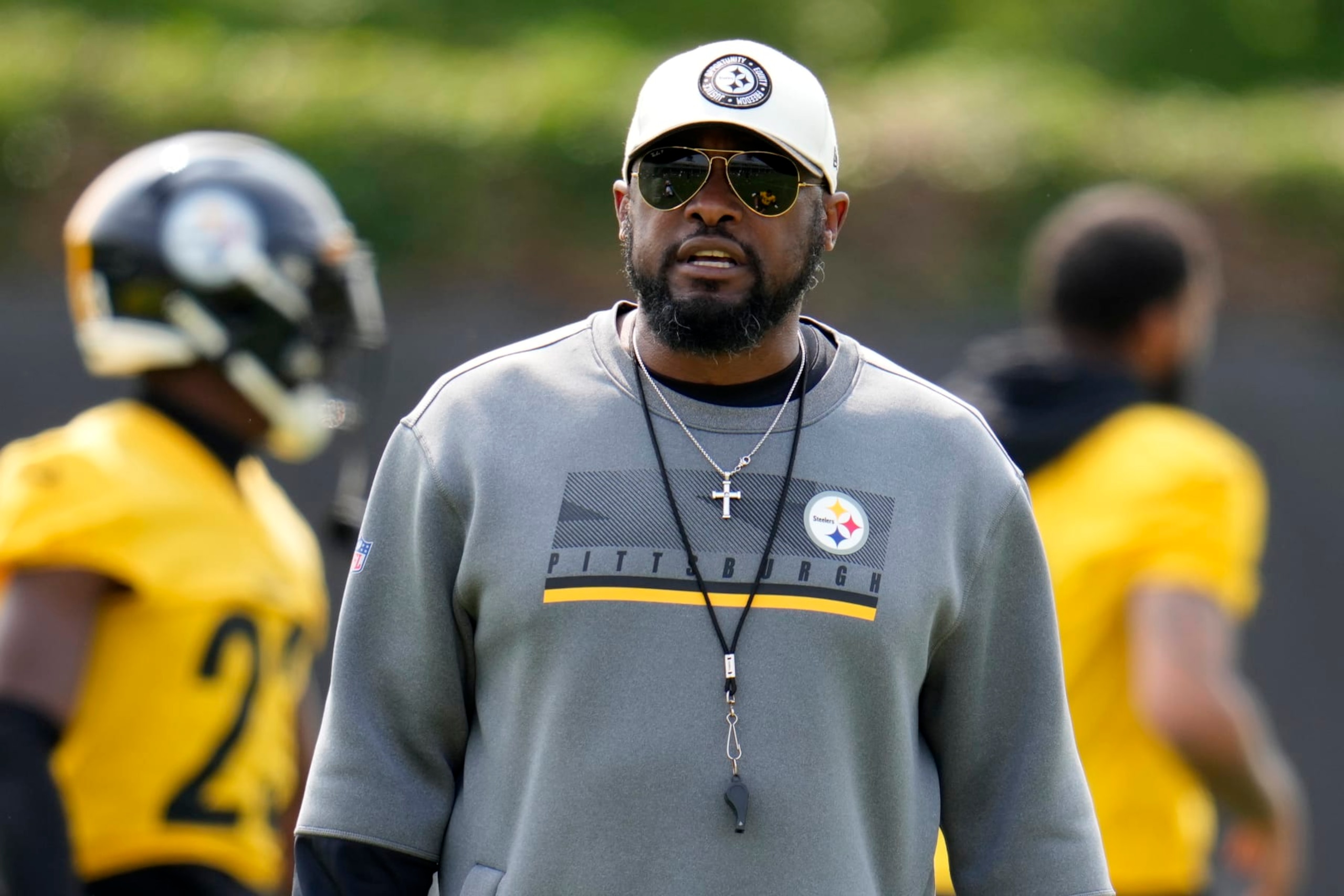 Pittsburgh Steelers head coach Mike Tomlin watches the NFL football team's OTA's in Pittsburgh Tuesday, May 23, 2023. (AP Photo/Gene J. Puskar)