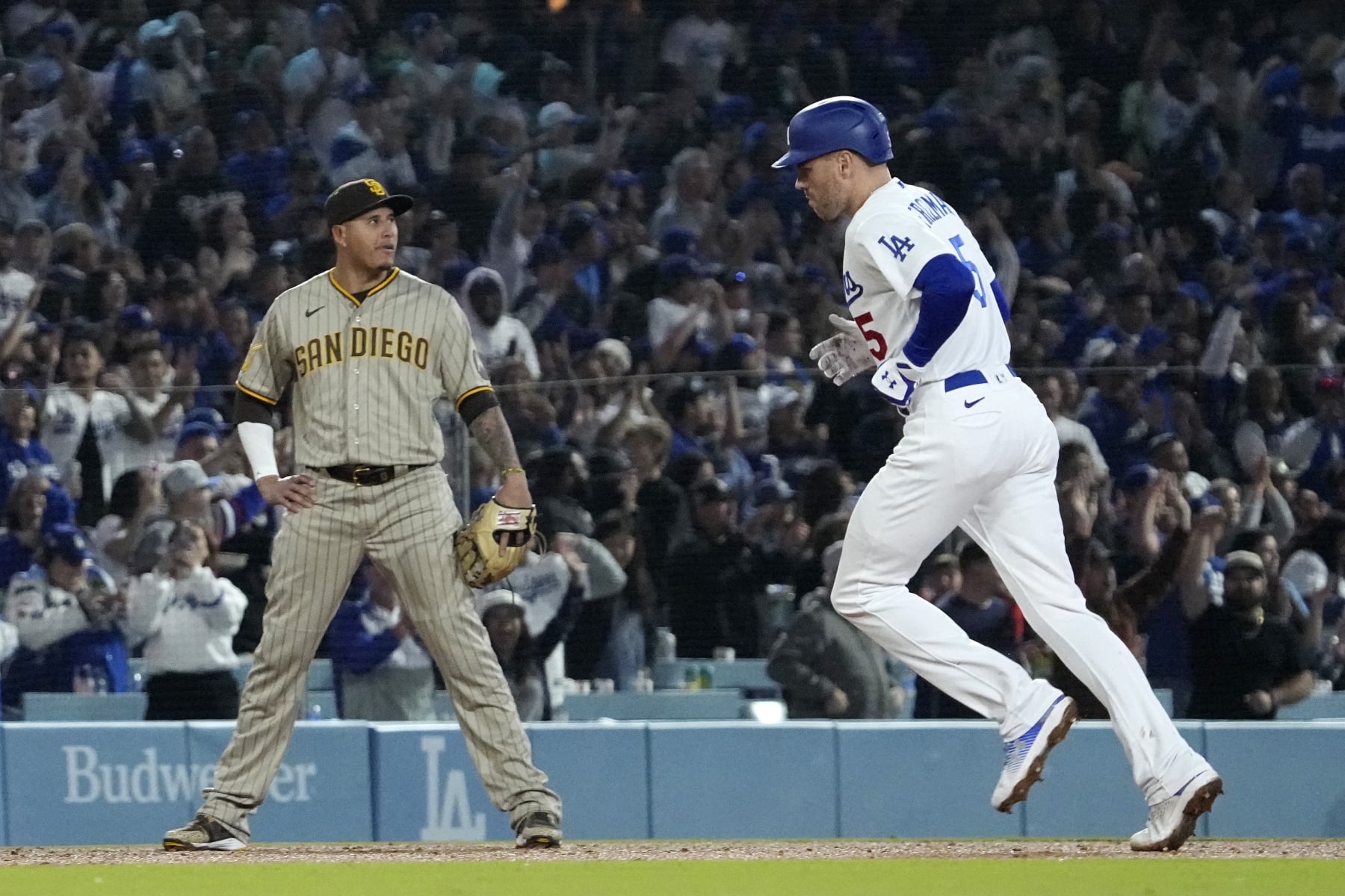 San Diego's Manny Machado (L) and Los Angeles' Freddie Freeman (R)