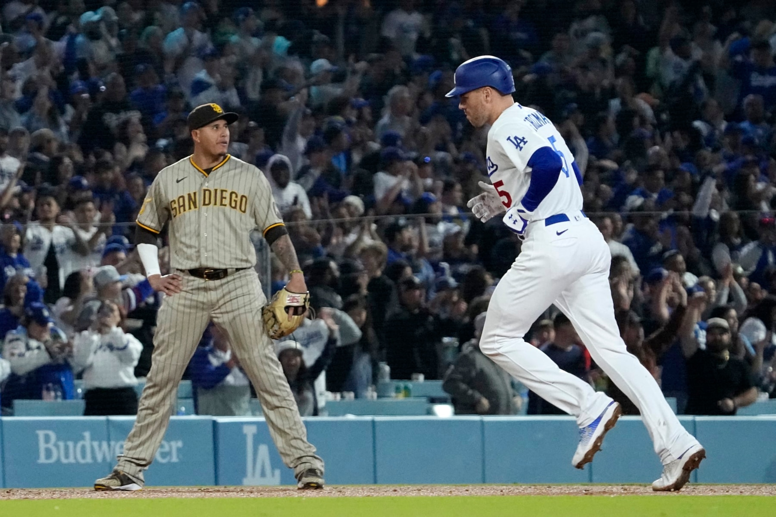 San Diego's Manny Machado (L) and Los Angeles' Freddie Freeman (R)